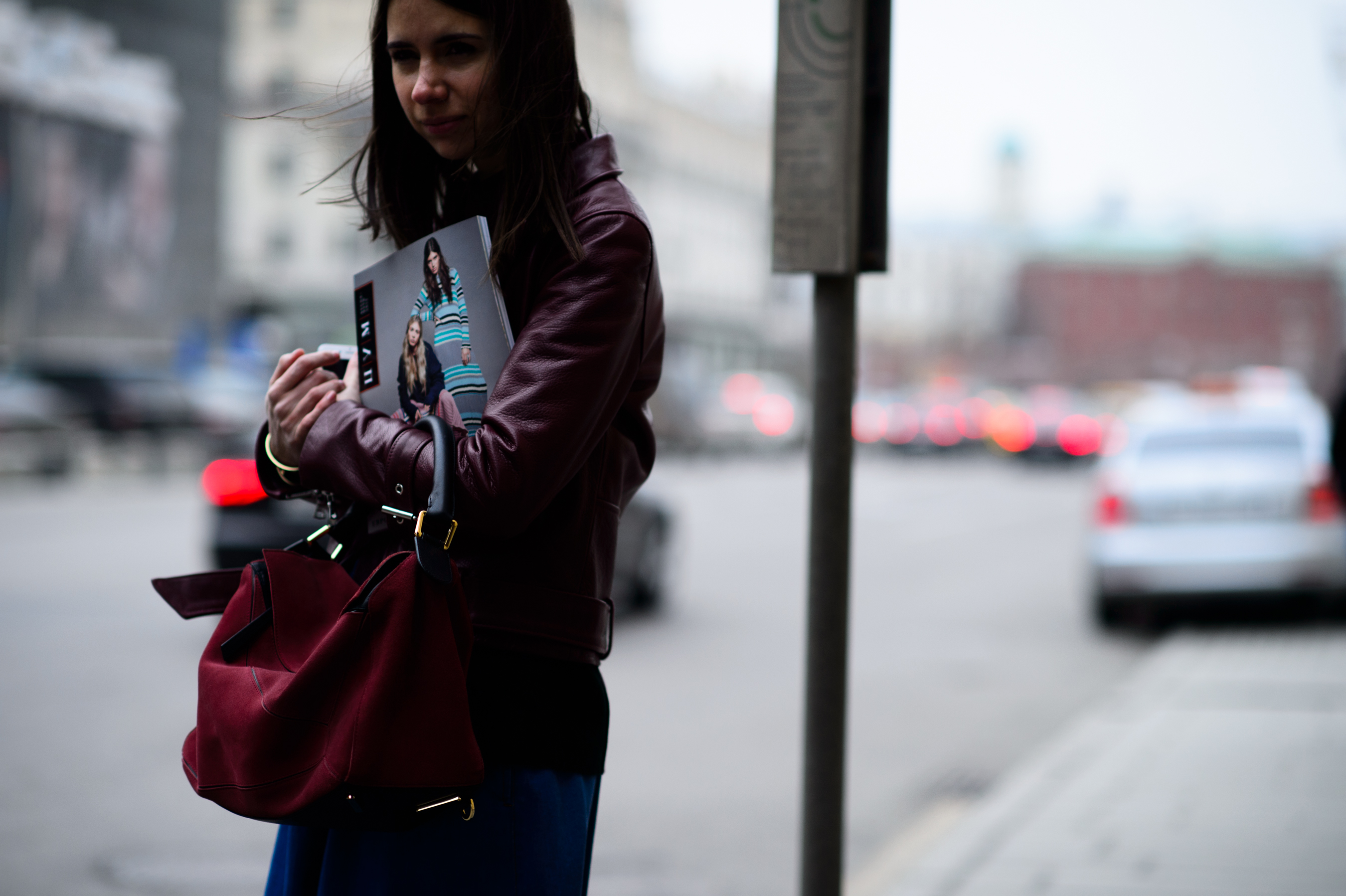 Russian girl wearing an oxblood jacket