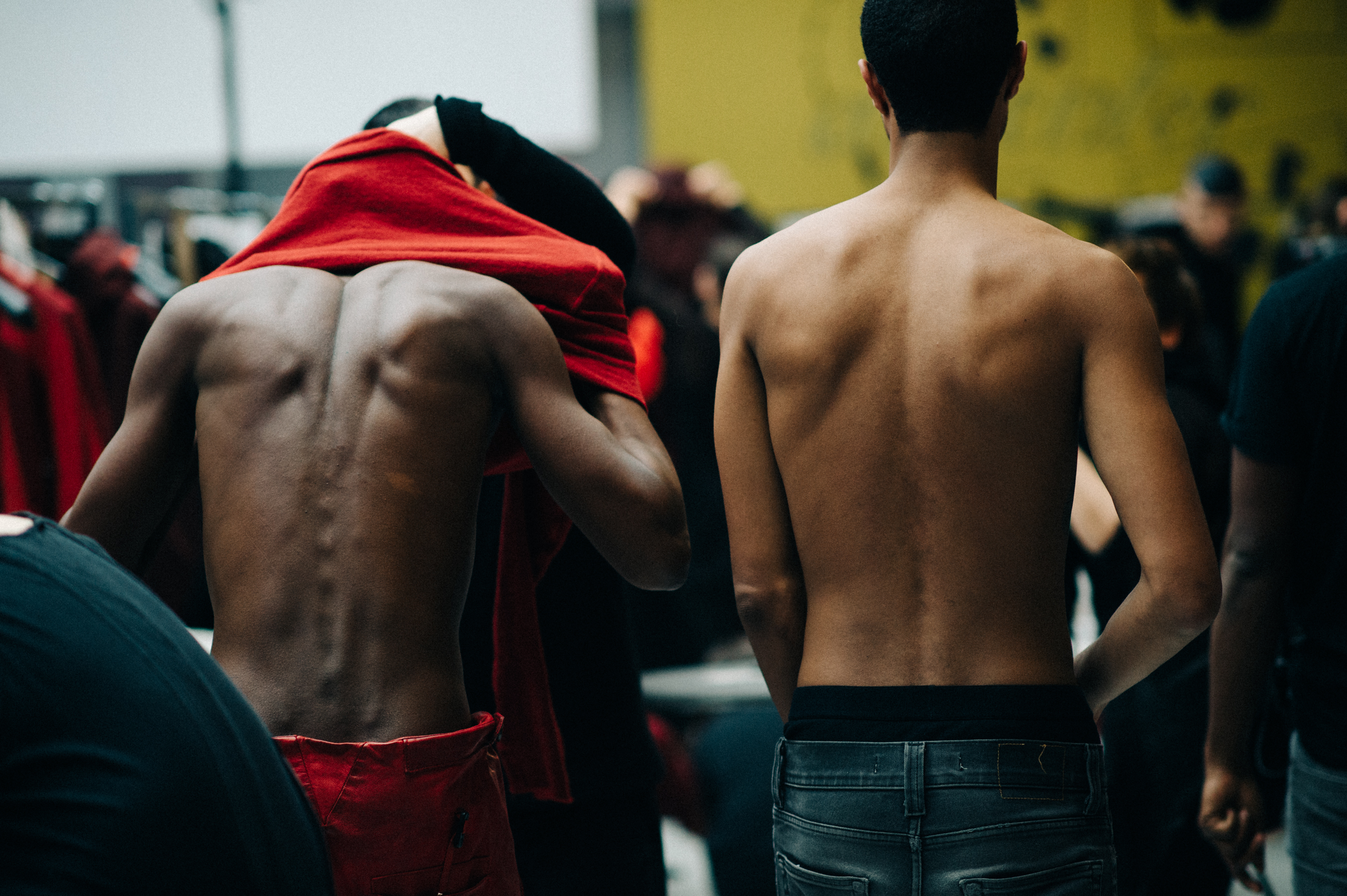 Male models getting dressed