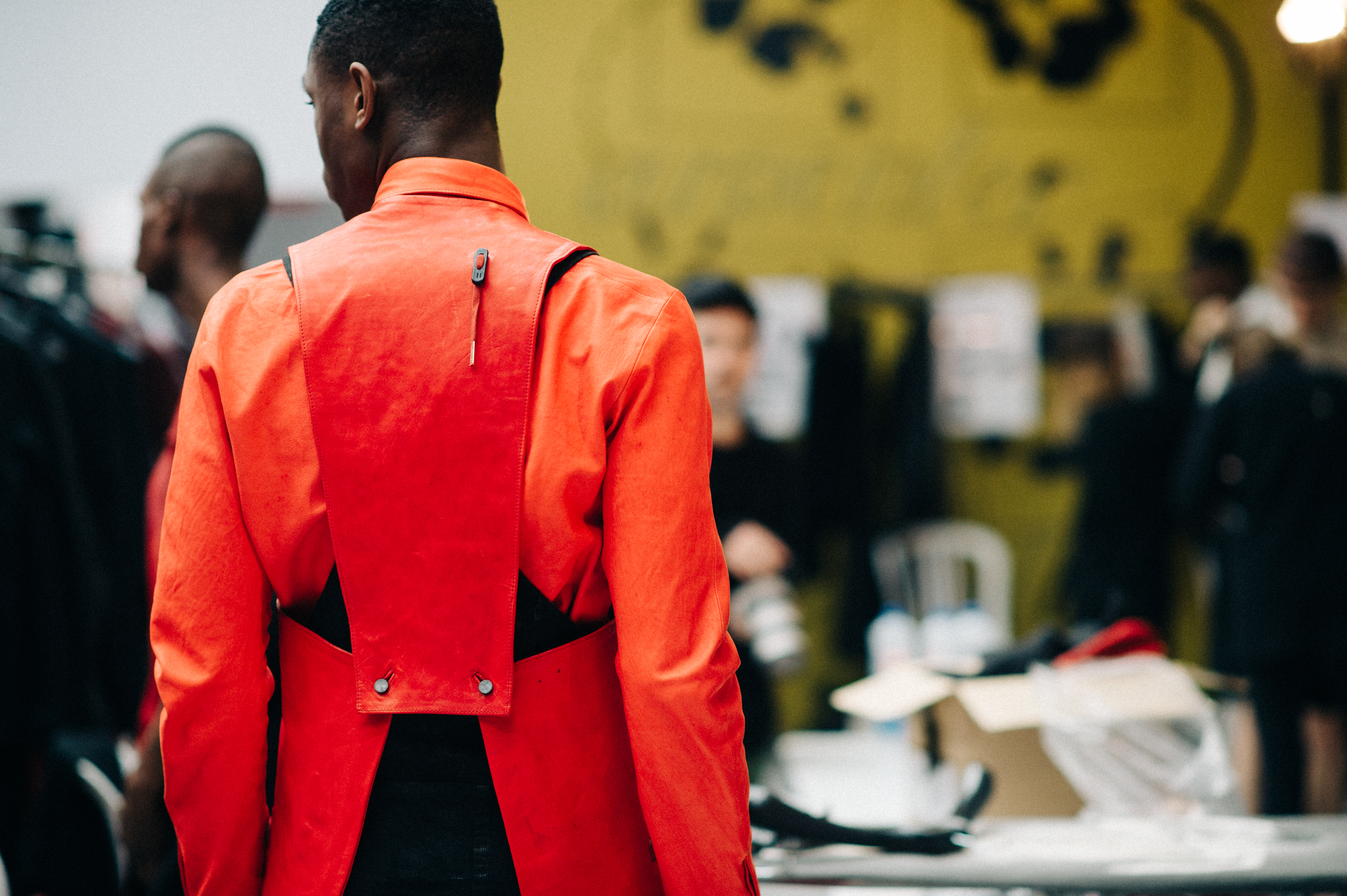 Male model Mac Phiri wearing red leather