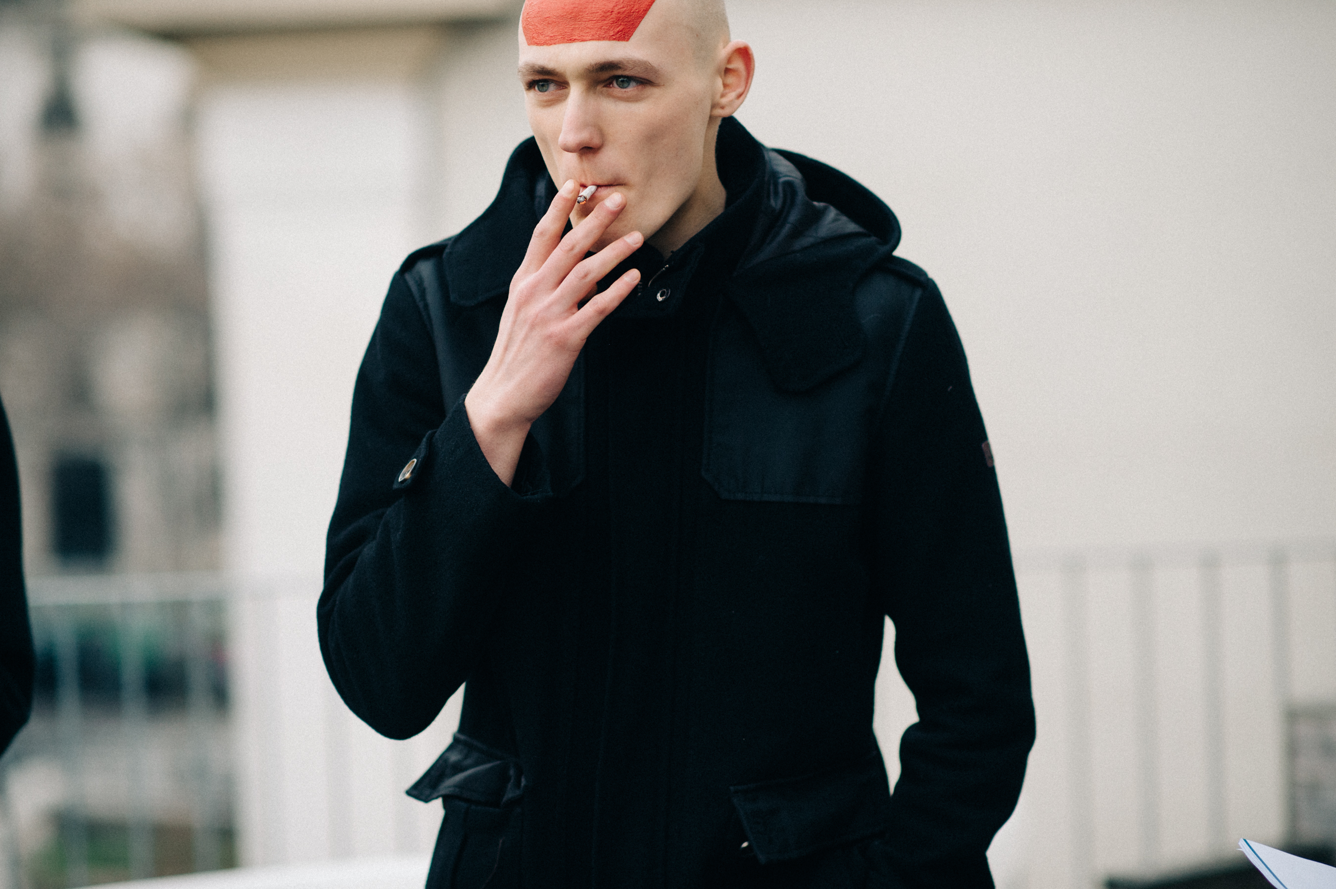 Male model smoking a cigarette