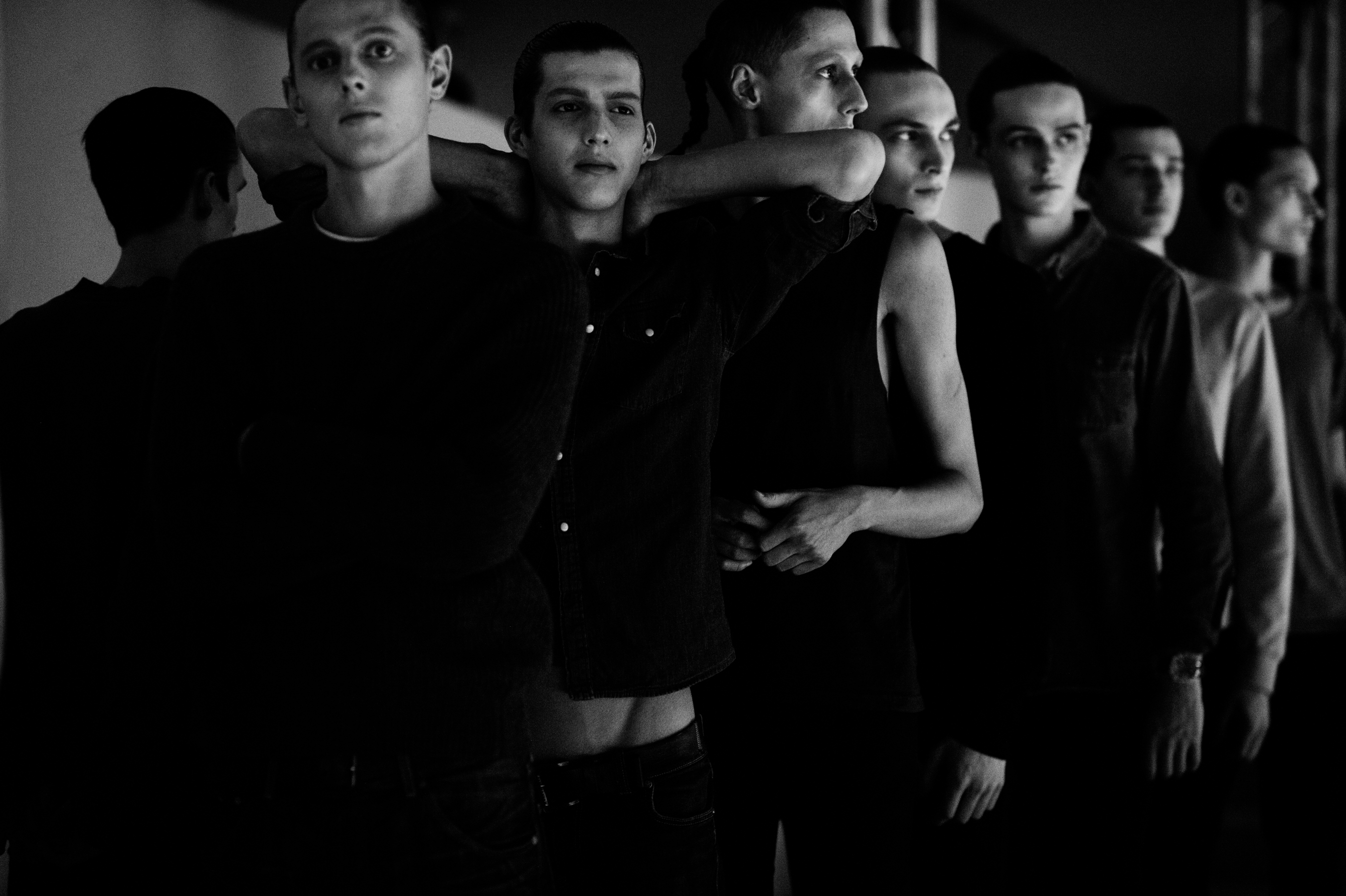 Male models before a fashion show