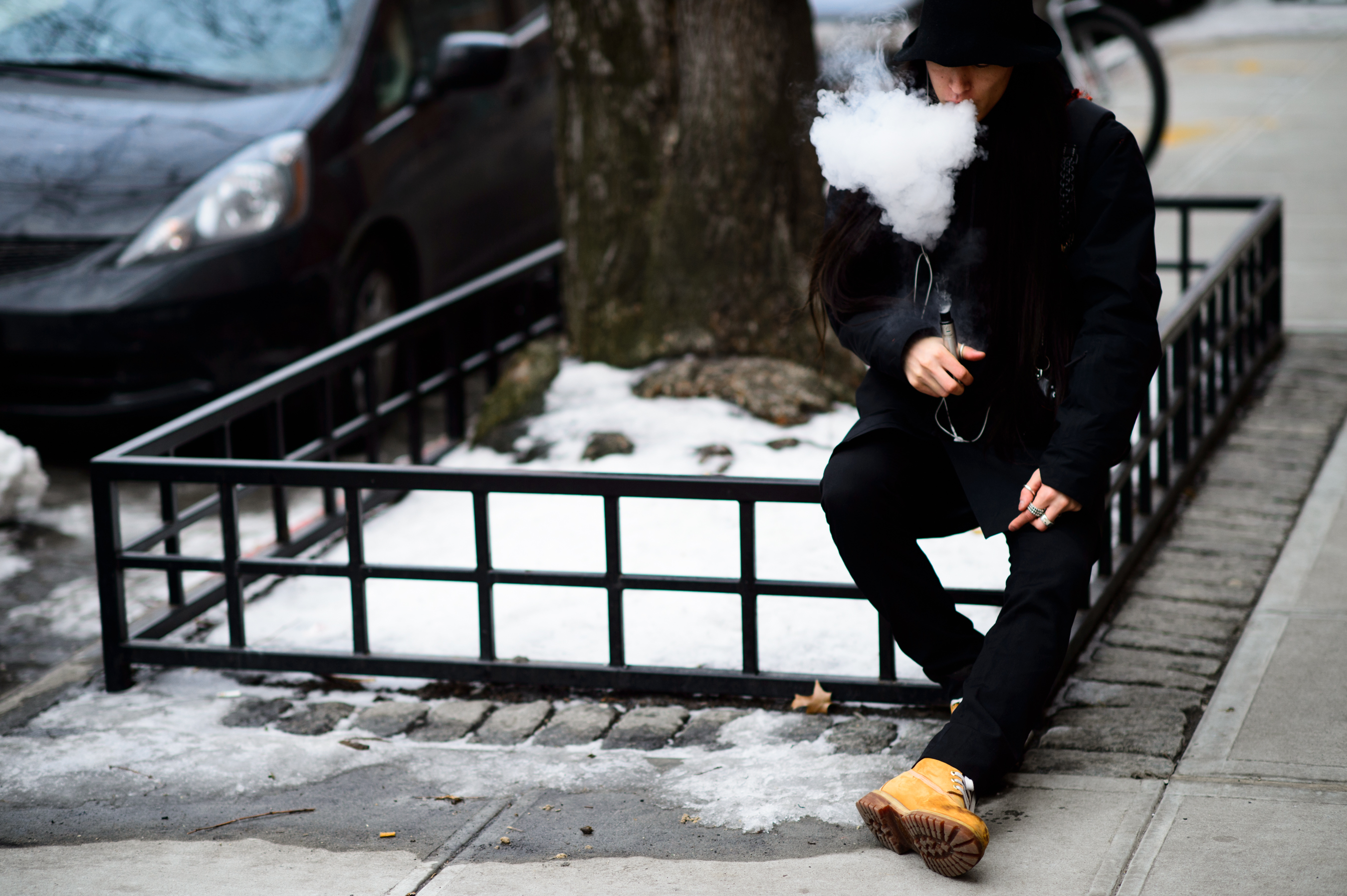 Japanese photographer smoking a vaporizer