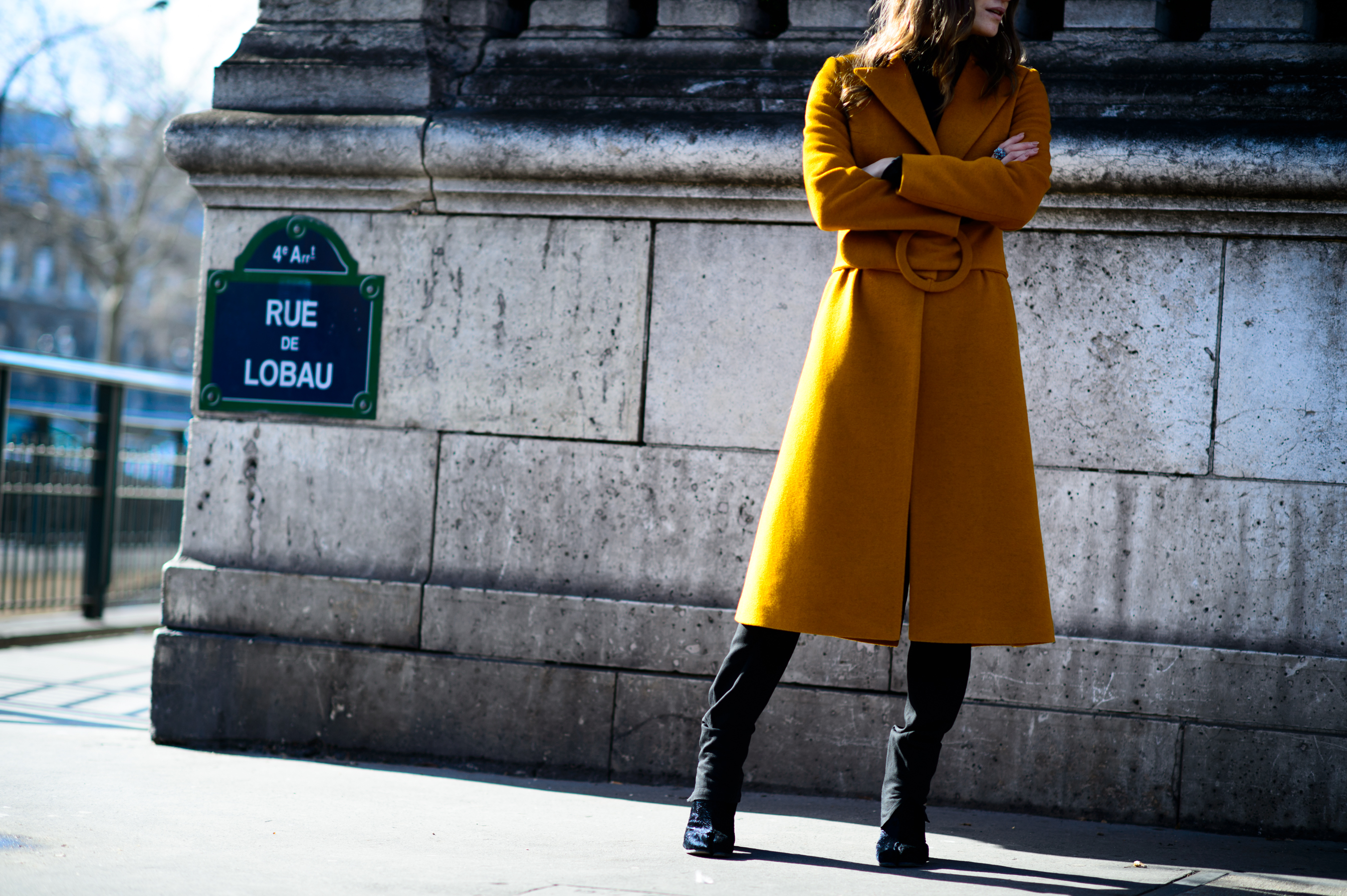 Ukrainian woman wearing BEVZA orange coat