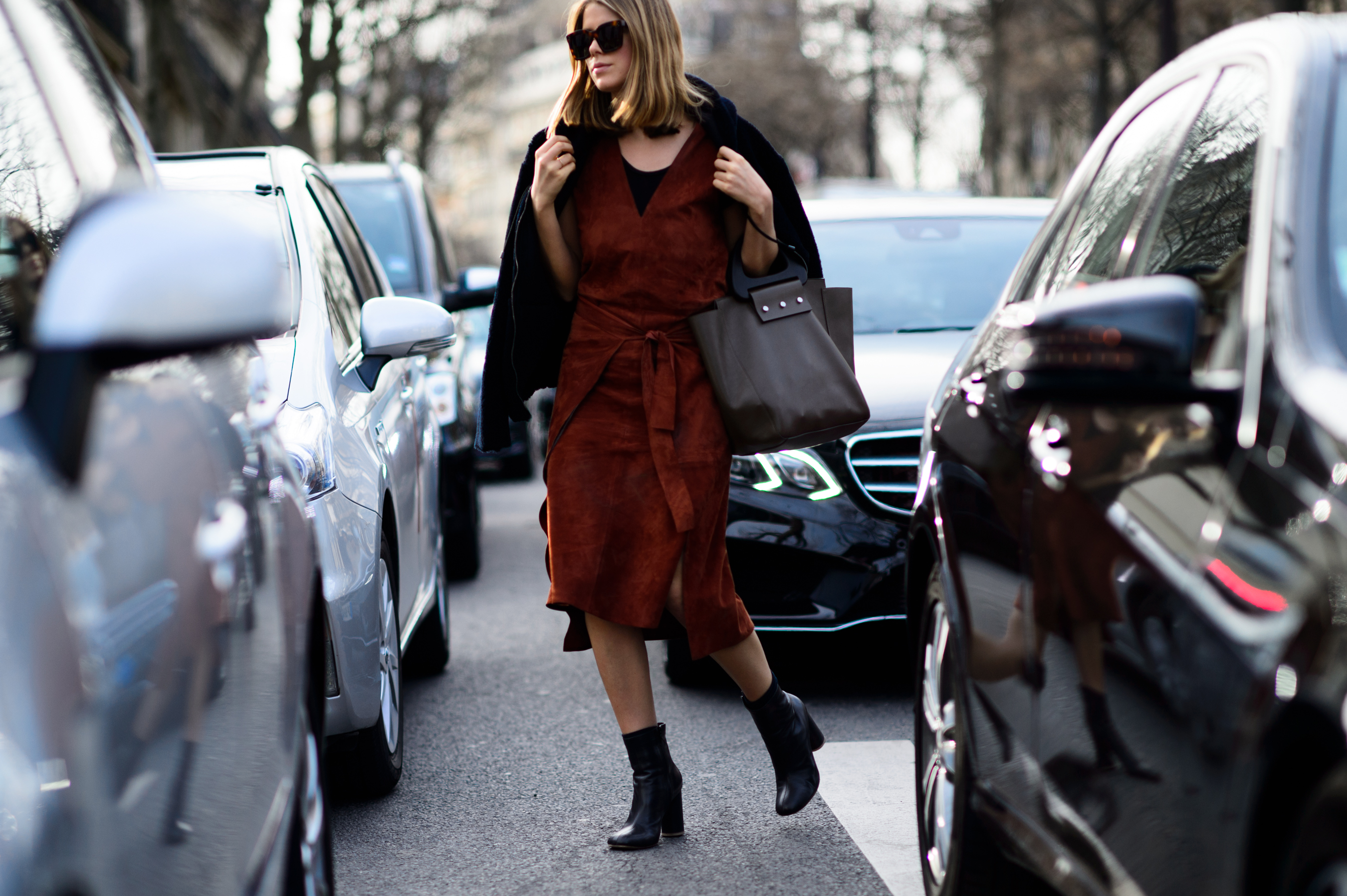 Woman wearing a red suede dress