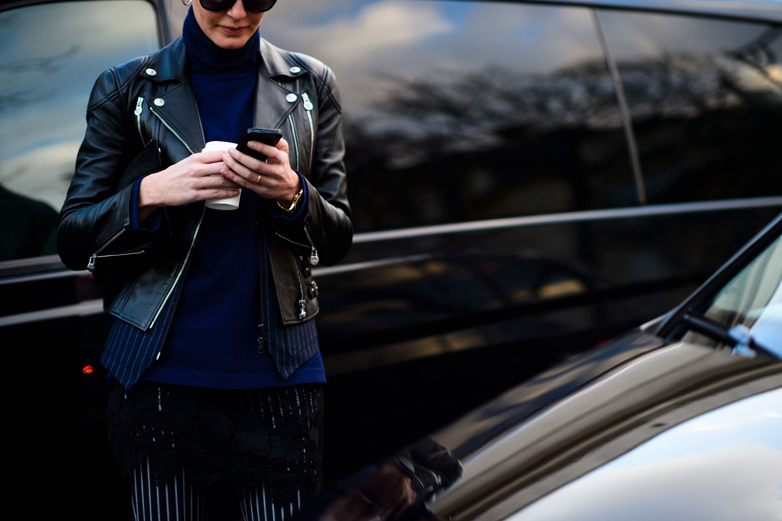 Turkish editor wearing a black leather jacket