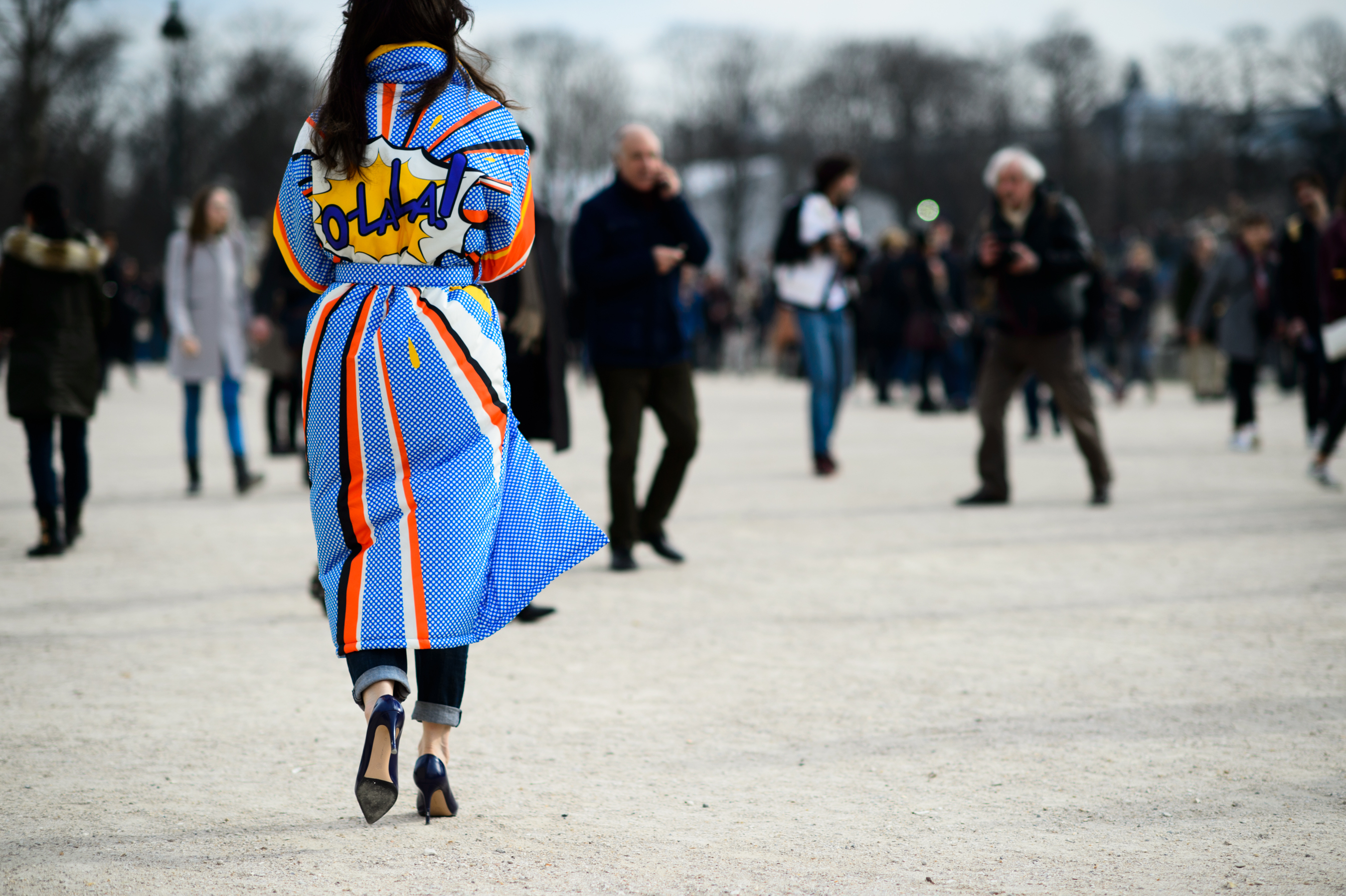 Woman wearing a graphic coat