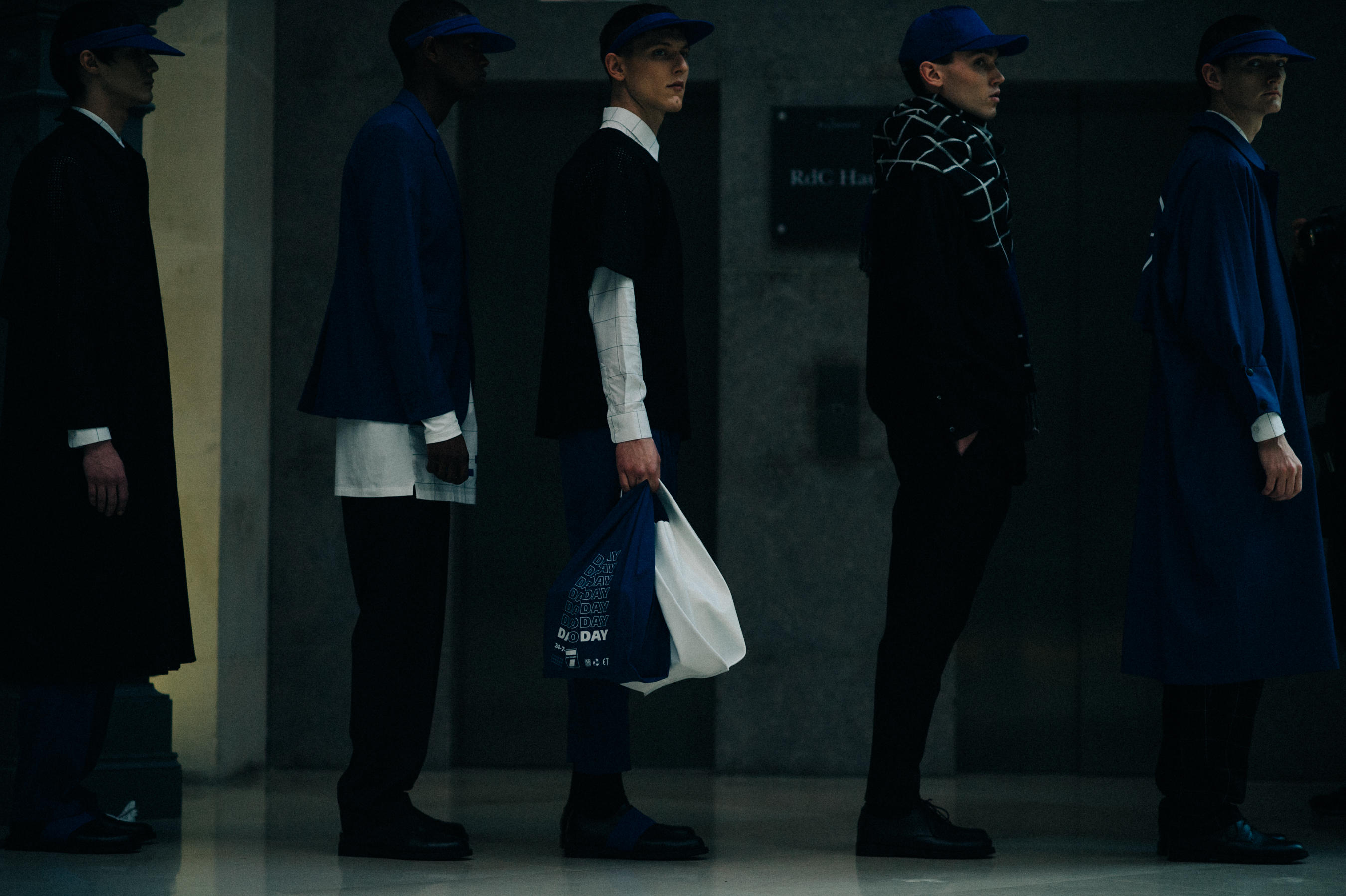 Male models before a fashion show