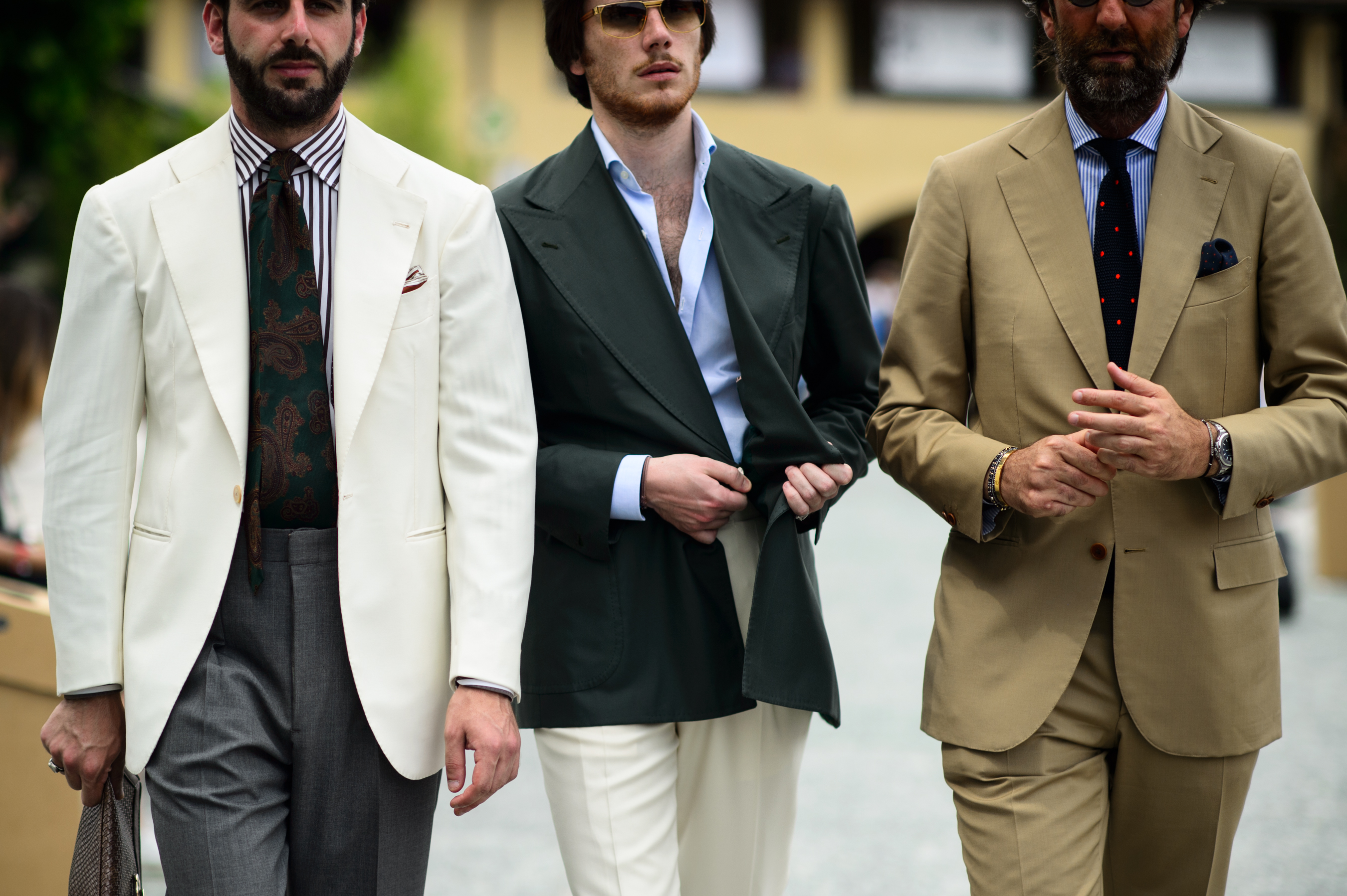 Three men wearing suits