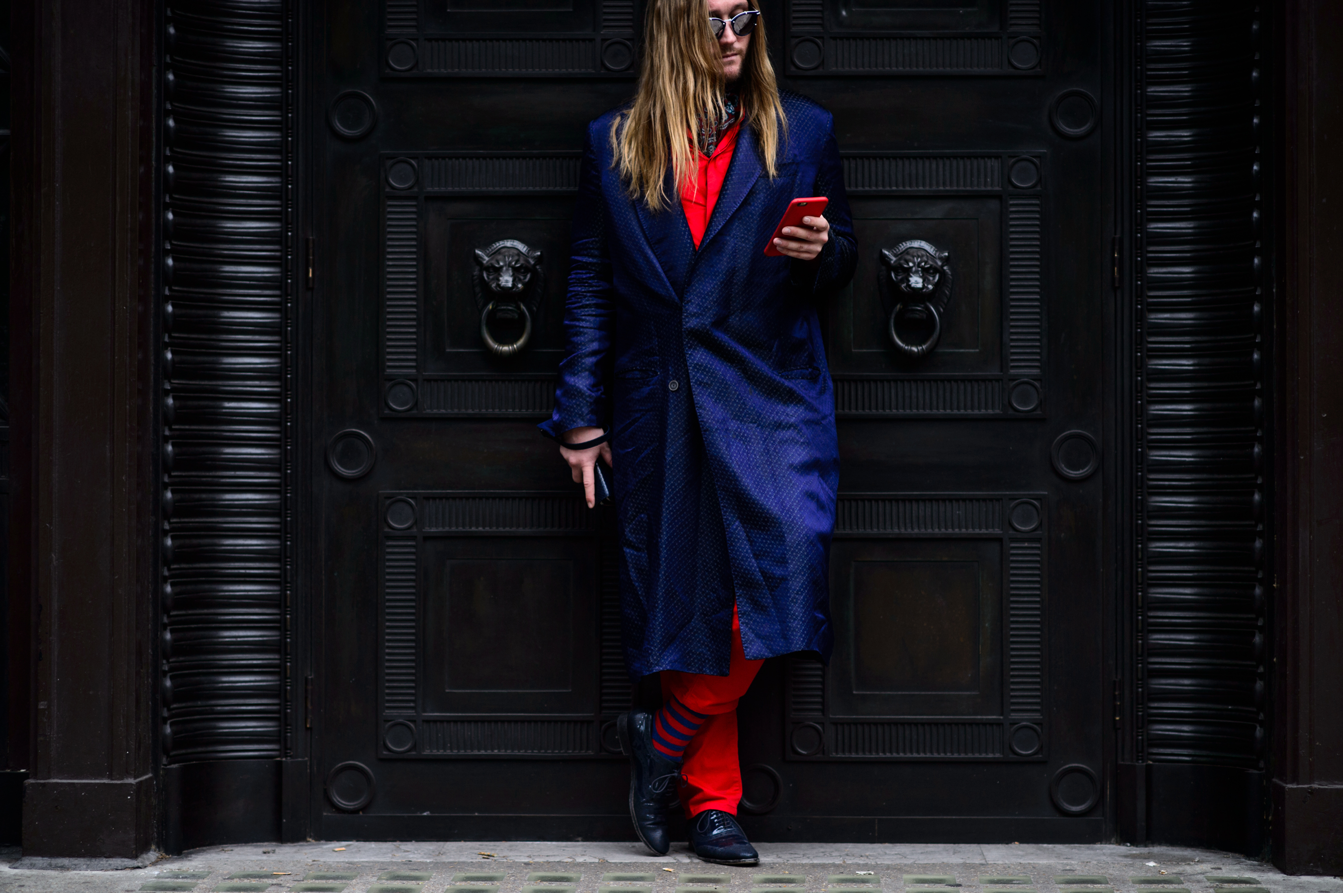 American man wearing blue and red