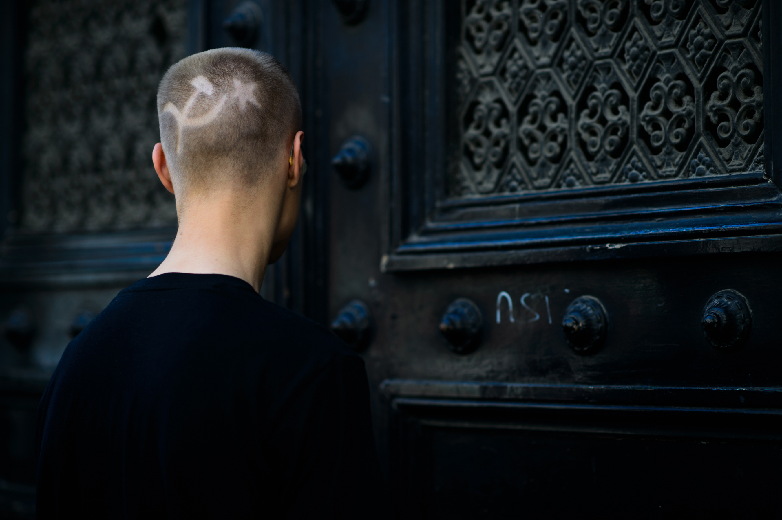Russian man with a sickle and Hammer in his hair