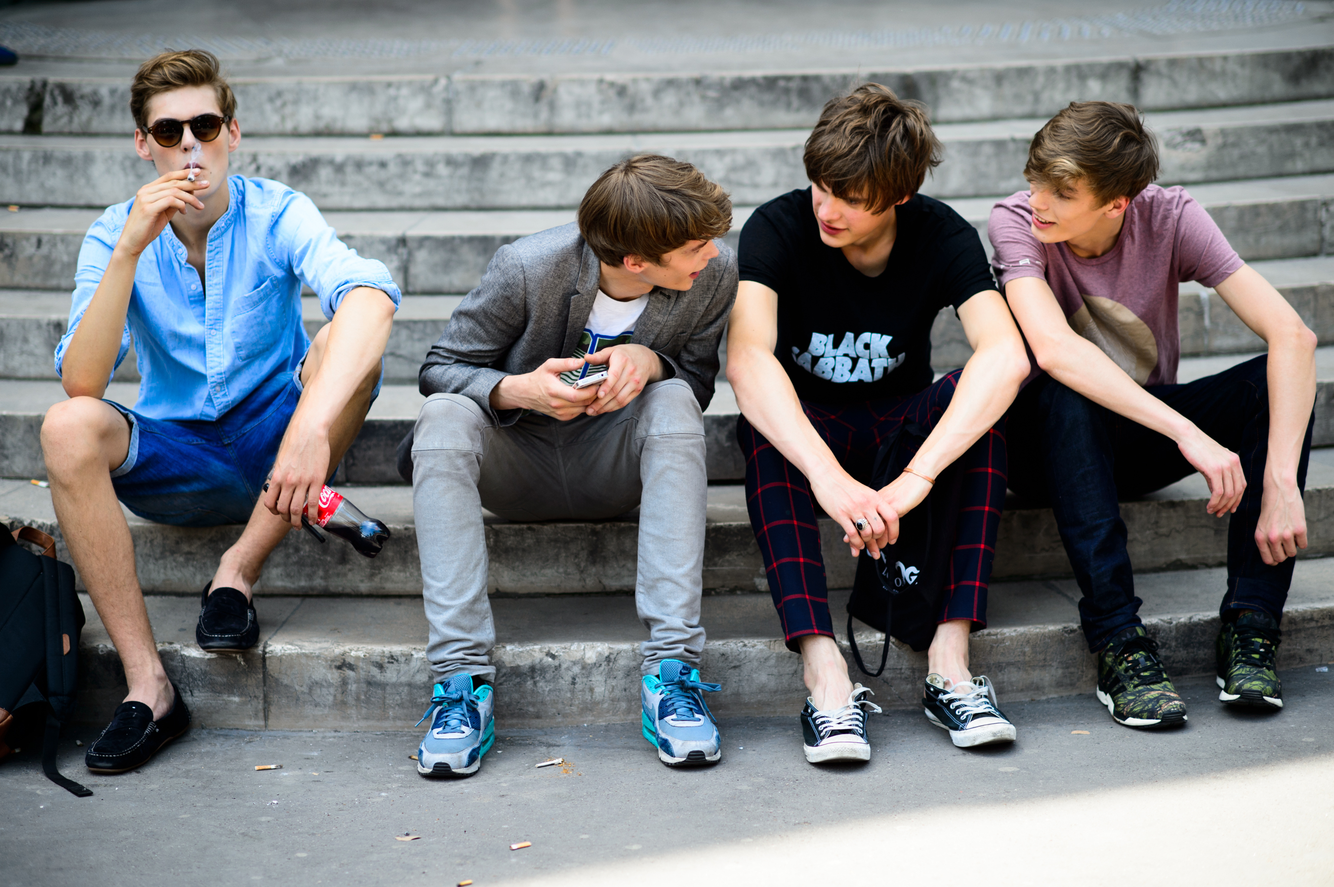Four male models before a show