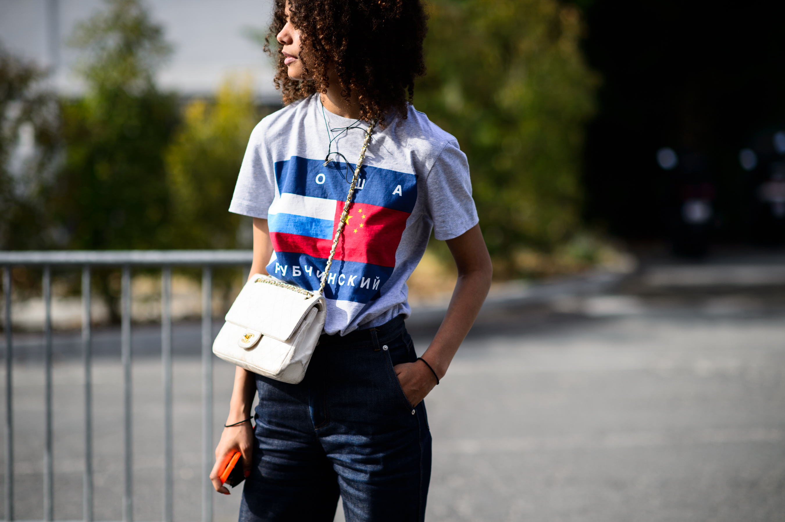 Woman wearing Chanel and Gosha Rubshinkiy