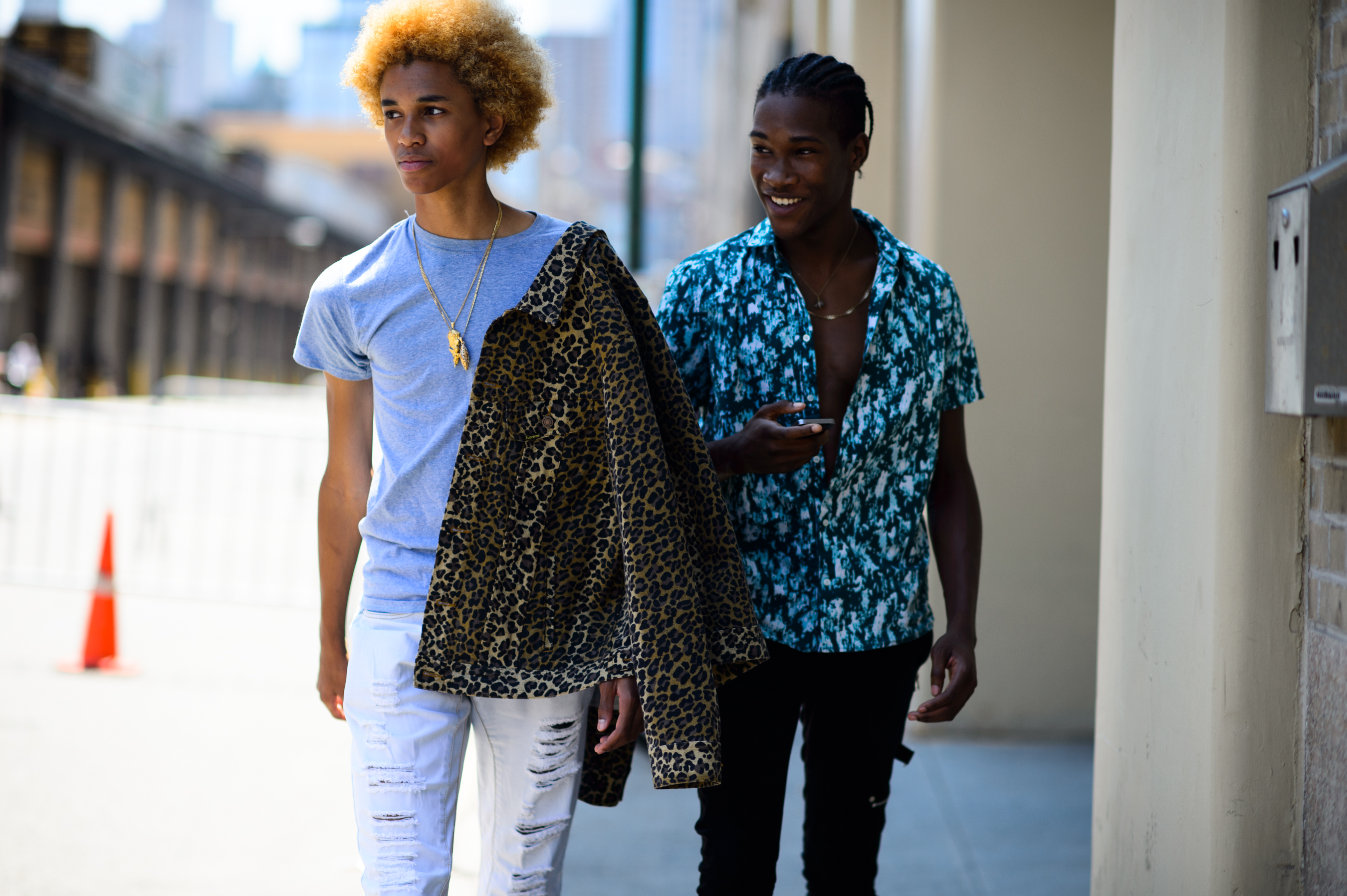 Two male models after a show