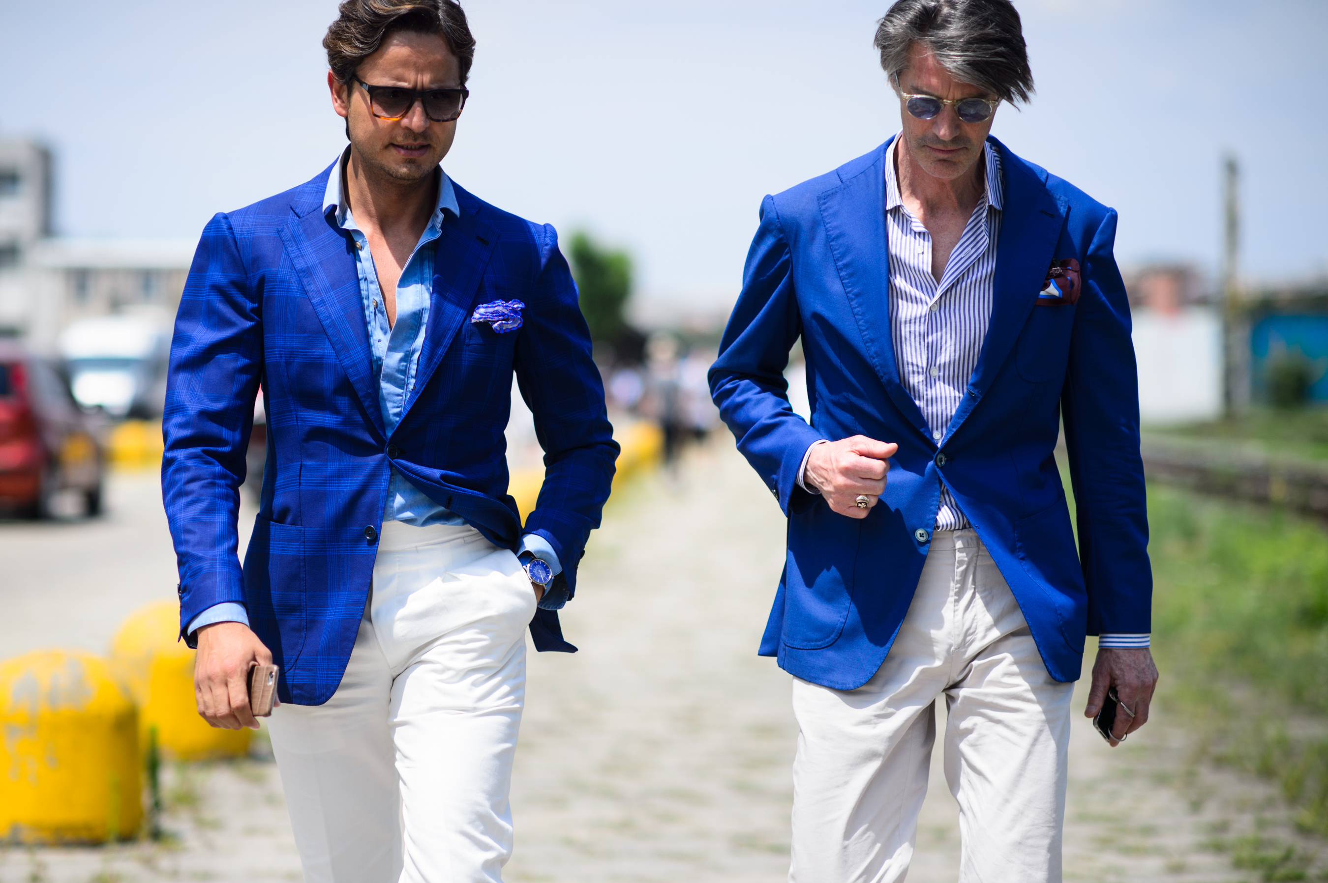 Two Italian men in blue jackets after the Gucci show