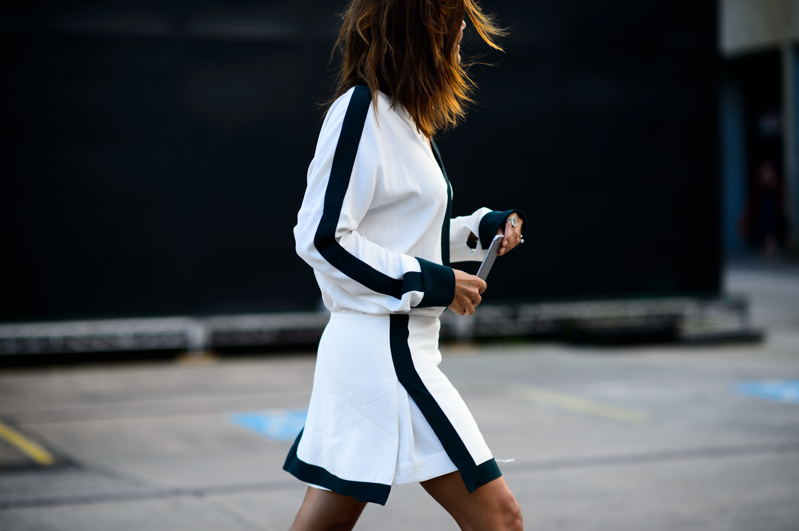 Vogue Australia editor after the fashion show wearing white outfit