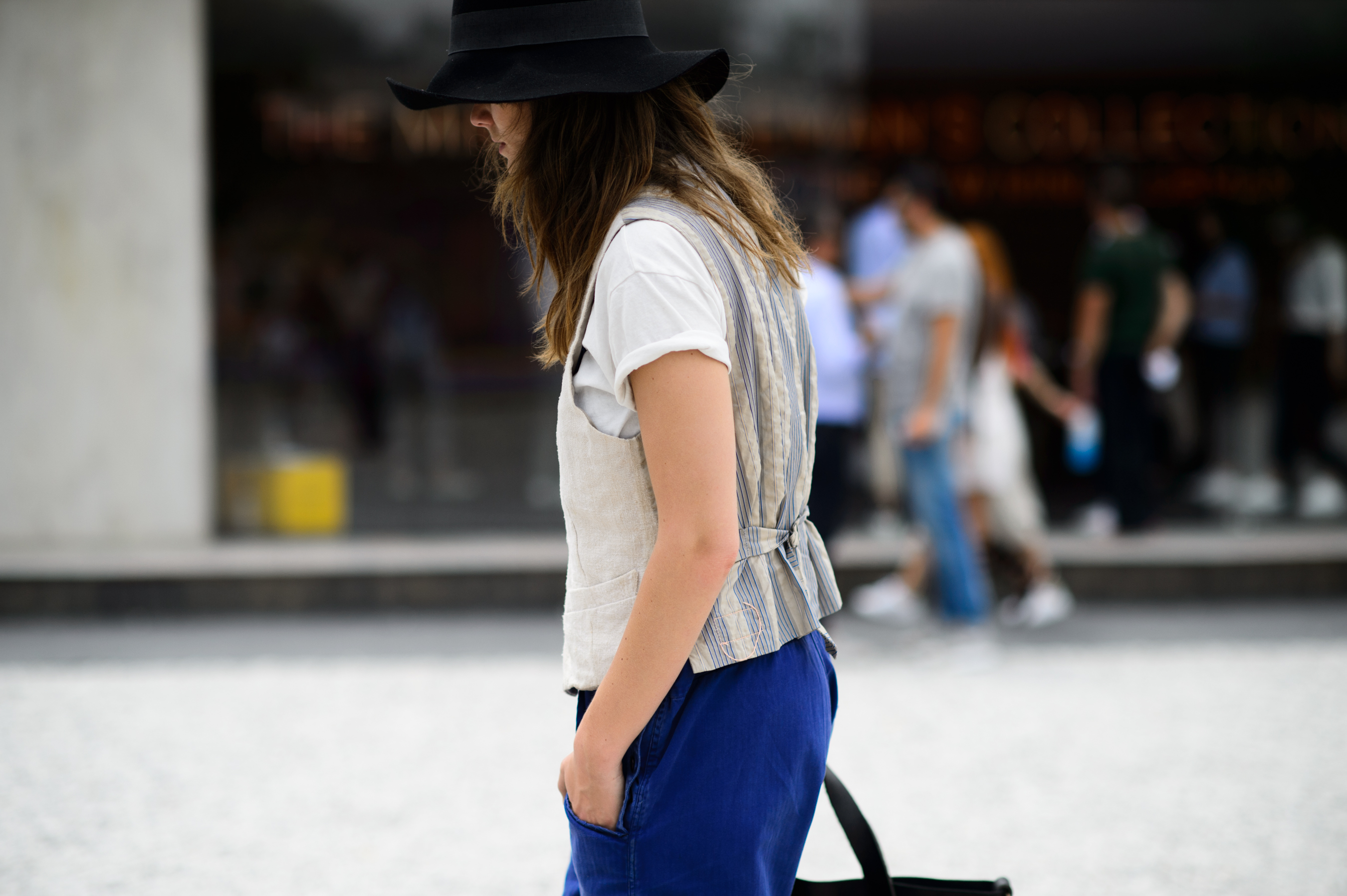 Woman wearing a suit at Pitti Uomo exhibition