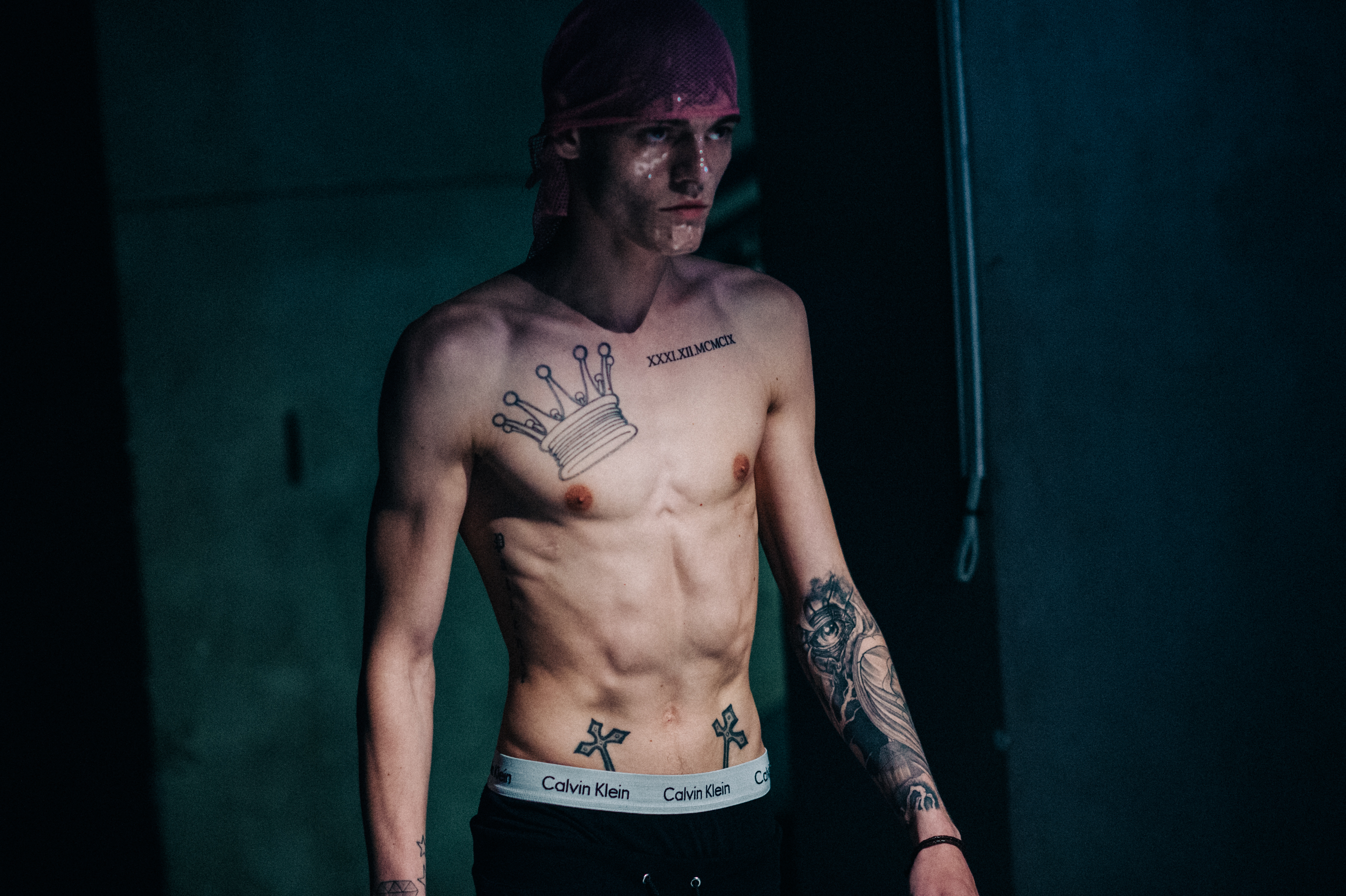 Danish male model with tattoos Marcus Arlien-Søborg during the rehearsal before the fashion show