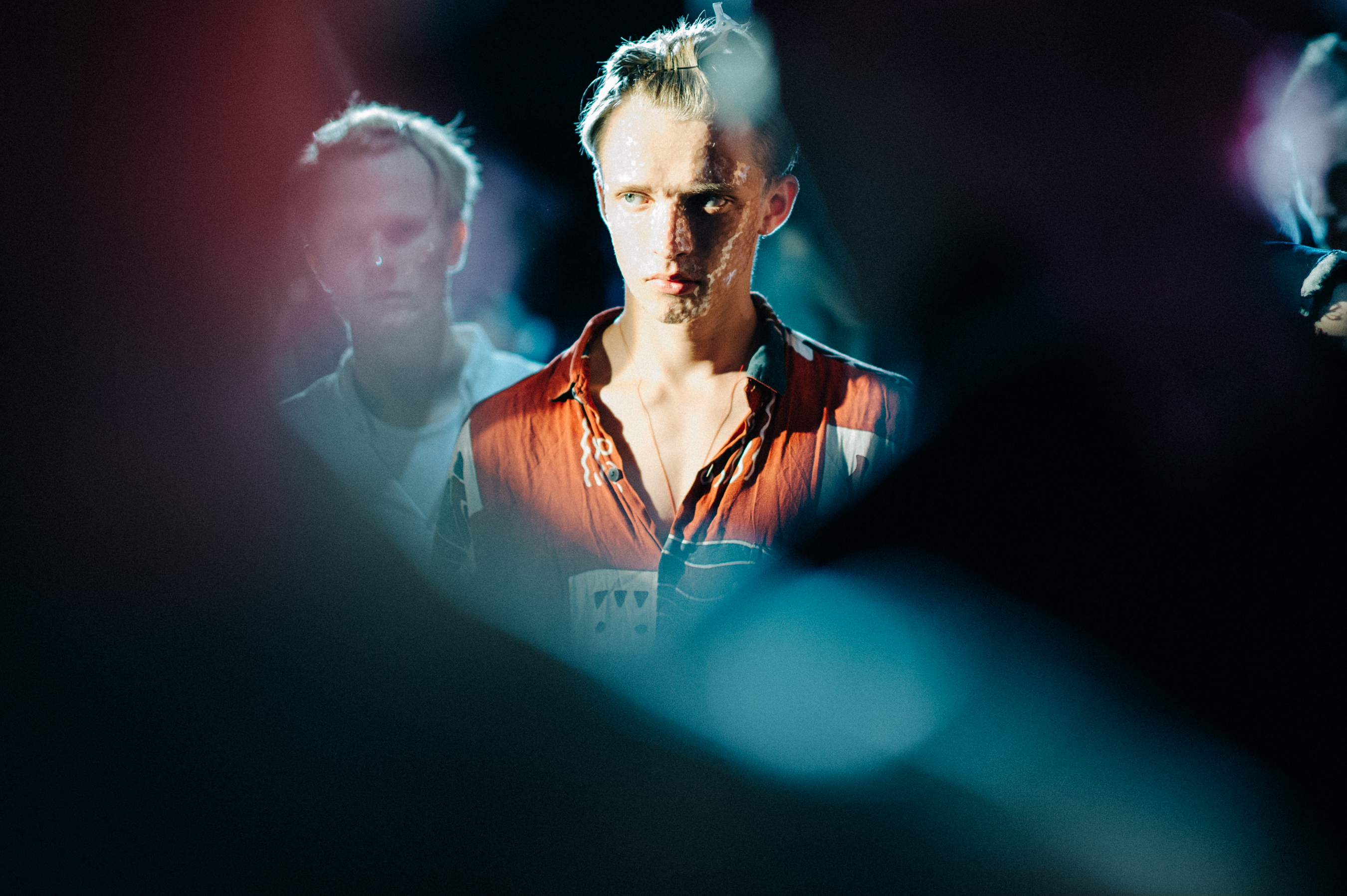 Male model close up during the rehearsal before the menswear fashion show