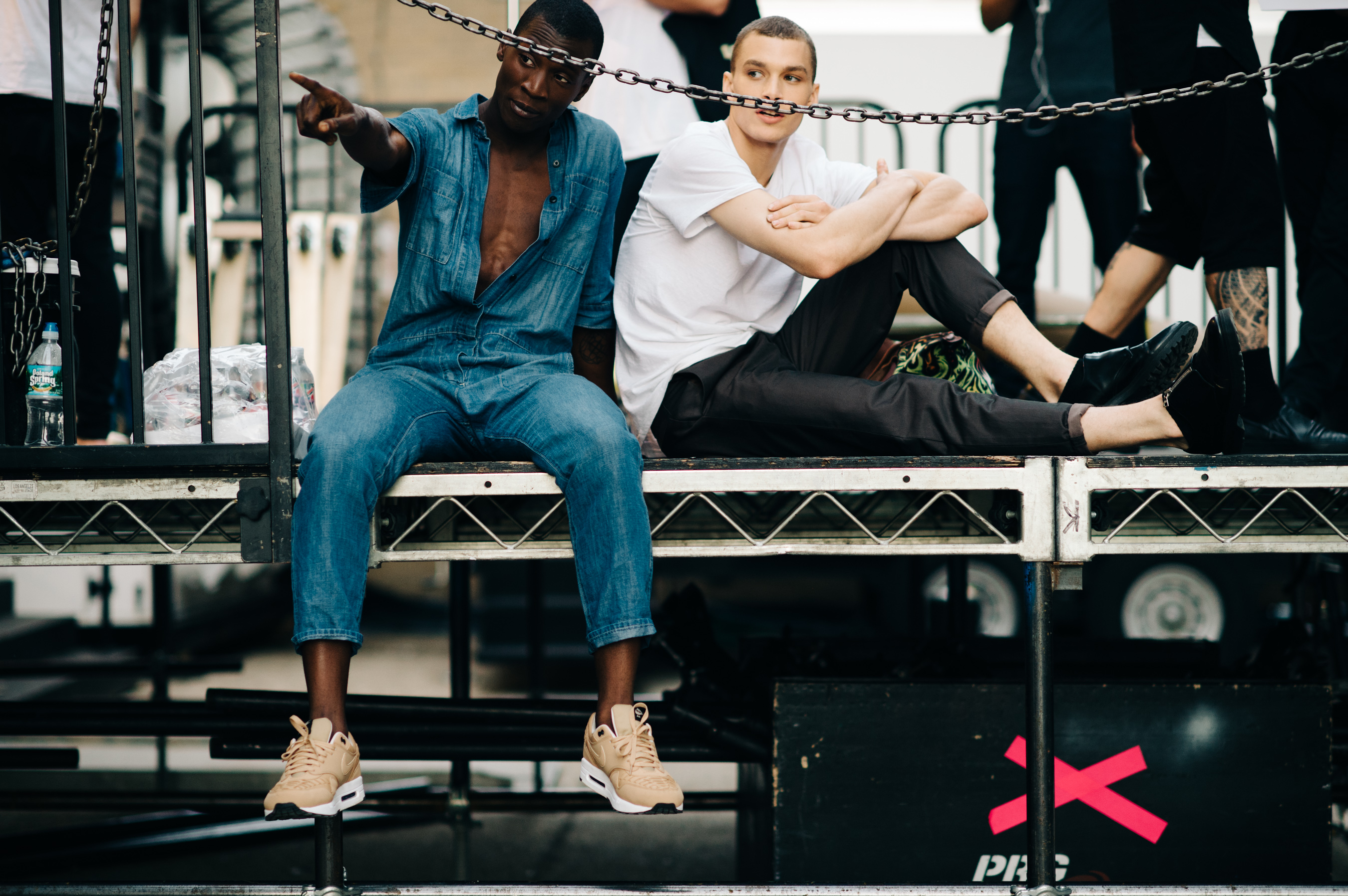Two male models before the show