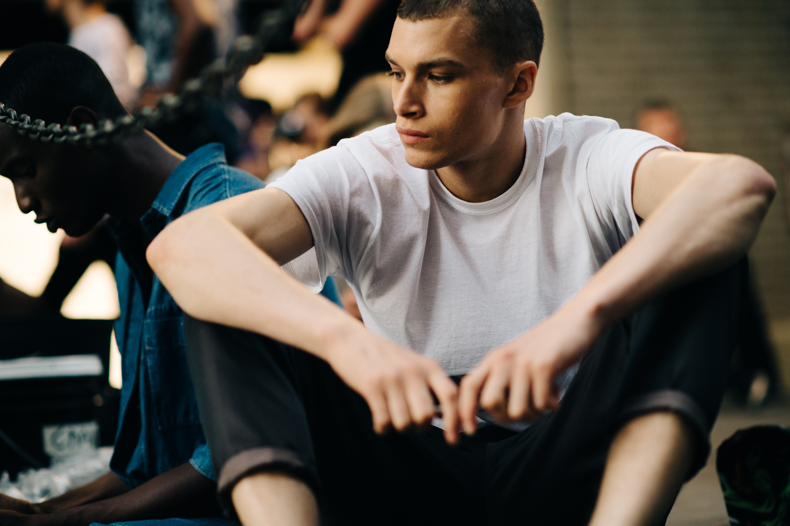 Male model wearing white t-shirt