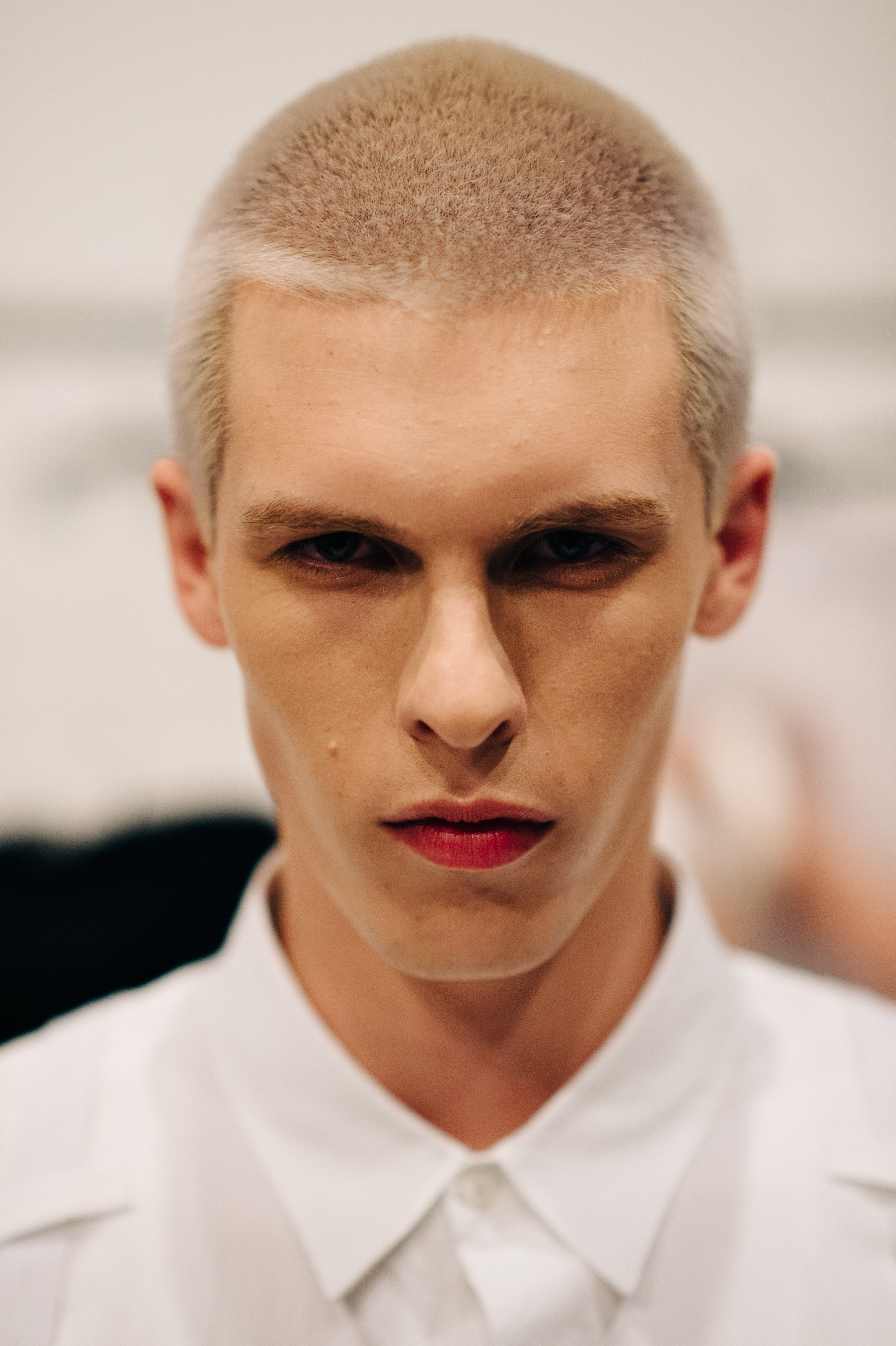 Portrait of a male model with white hair
