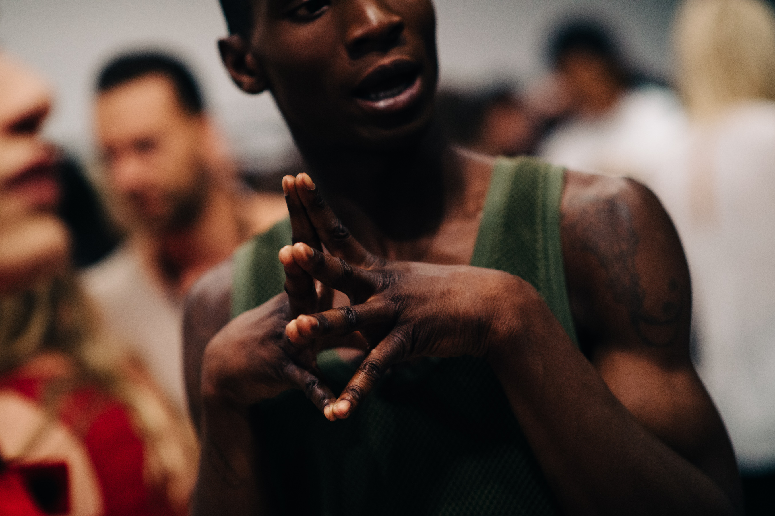 Male model stretching before the show