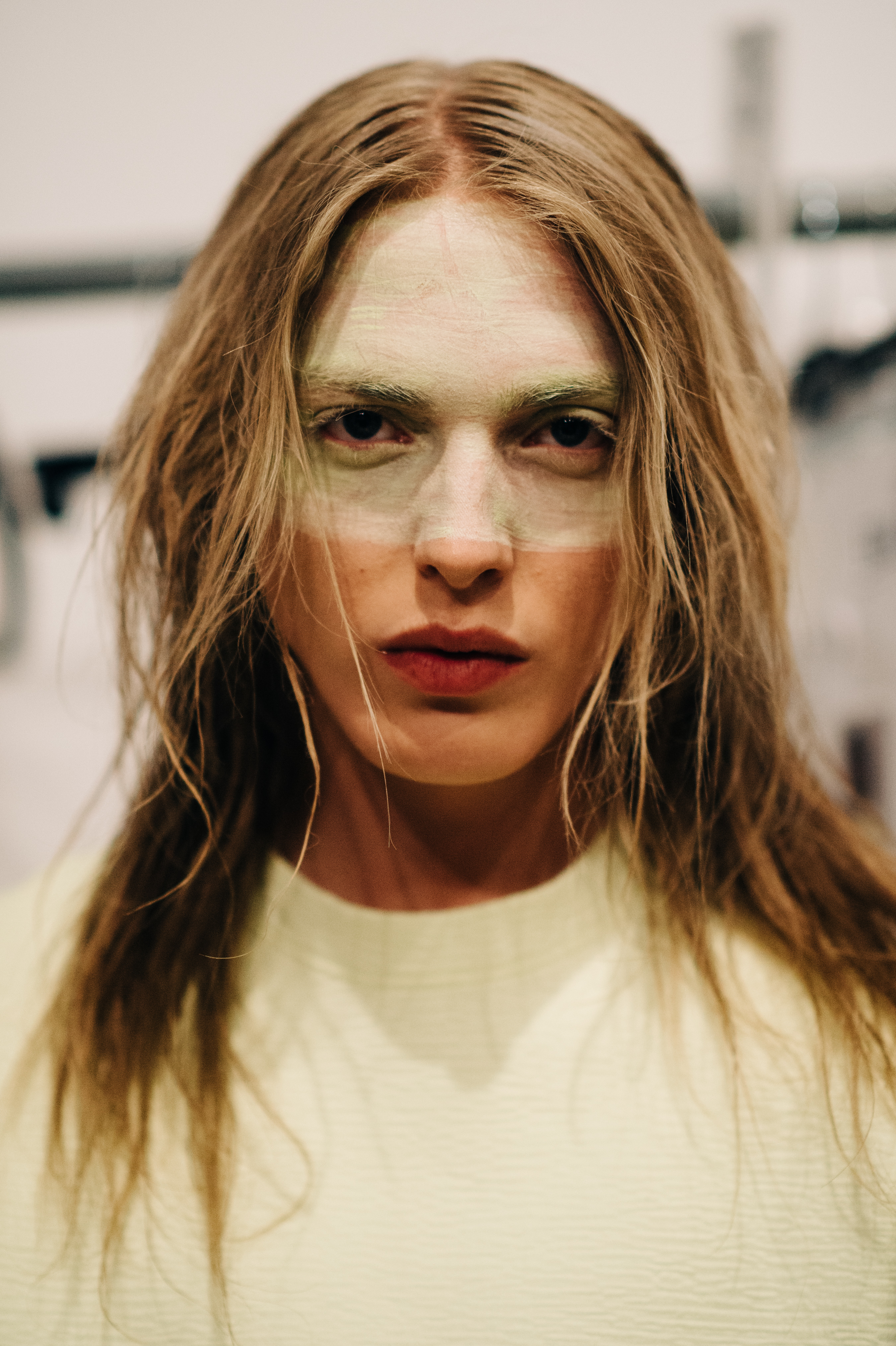 Portrait of male model with long white hair