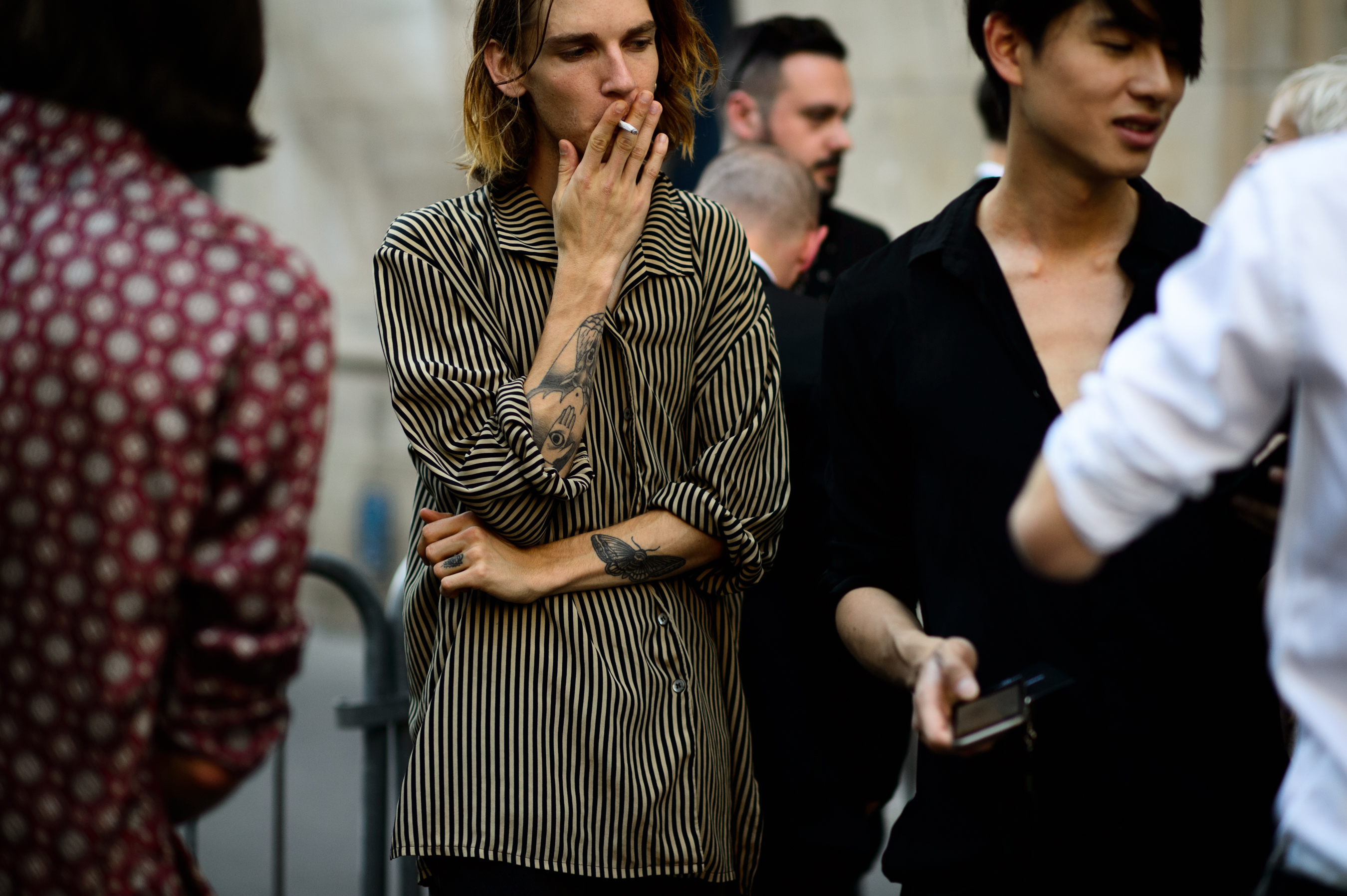 Male model smoking a cigarette