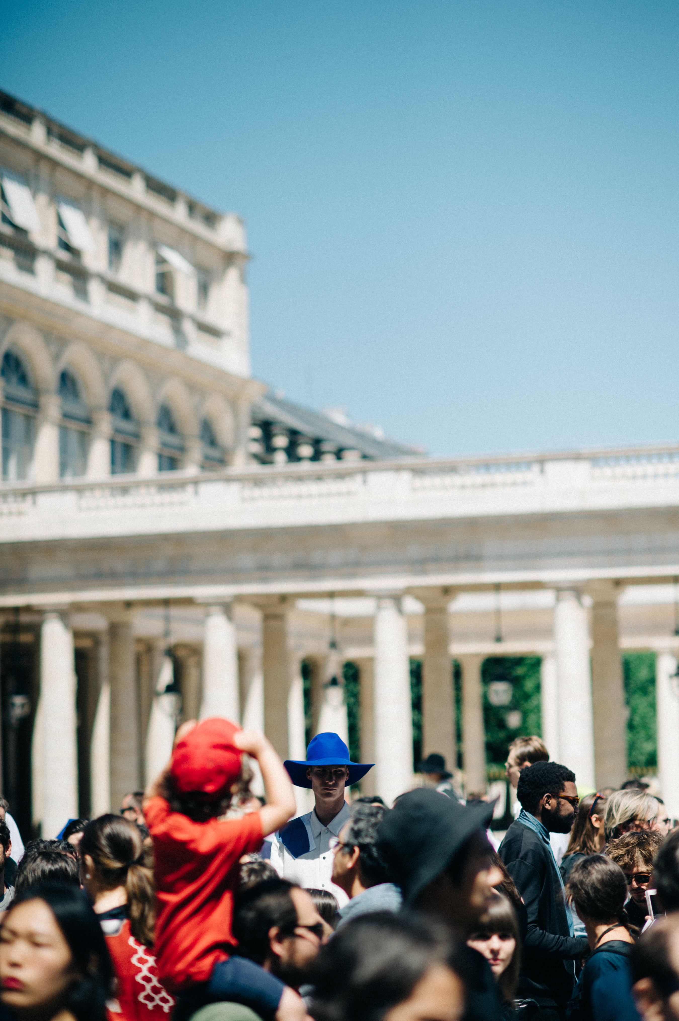 Male model in blue hat at the fashion show