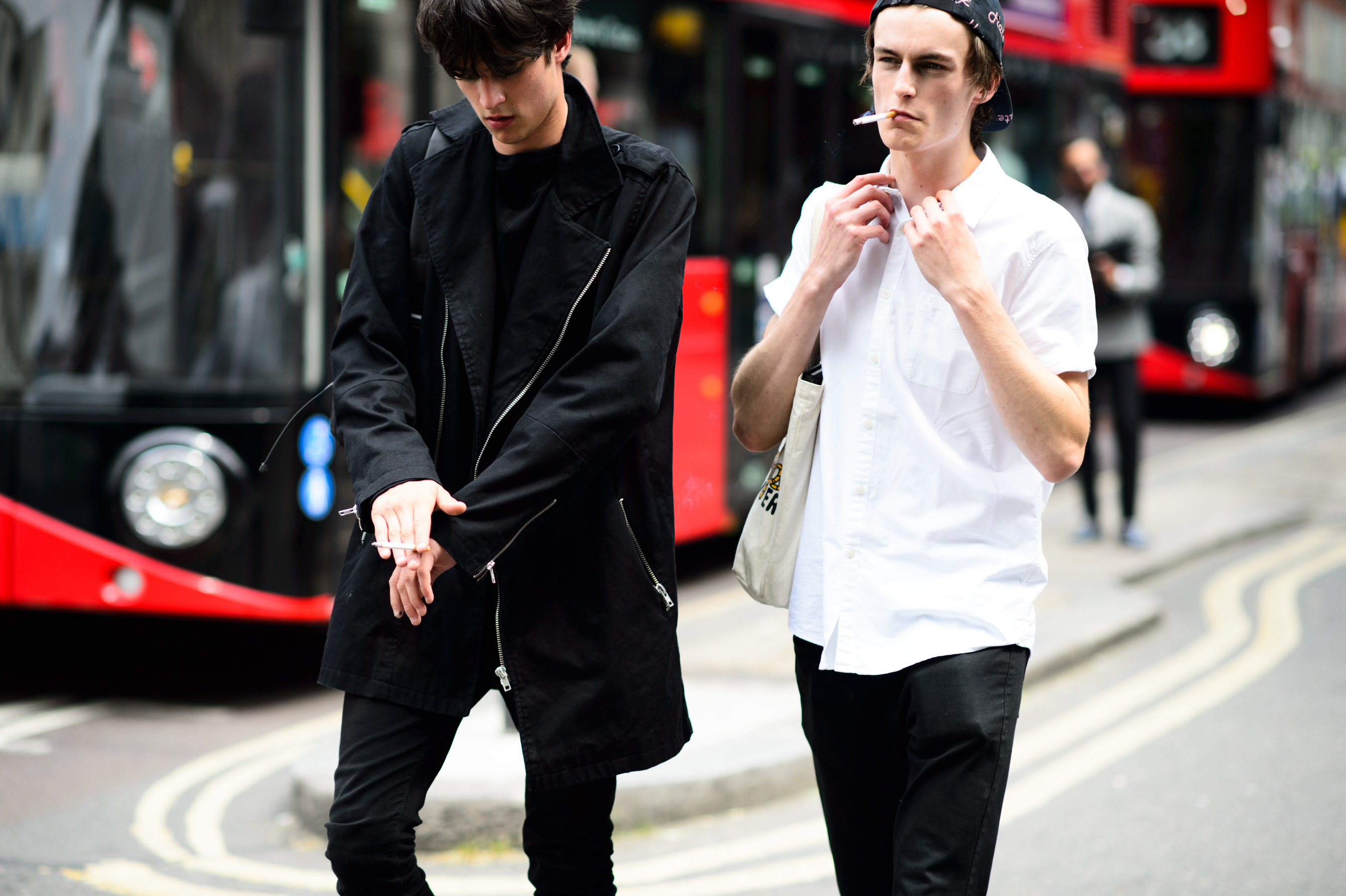 Two male models after the show