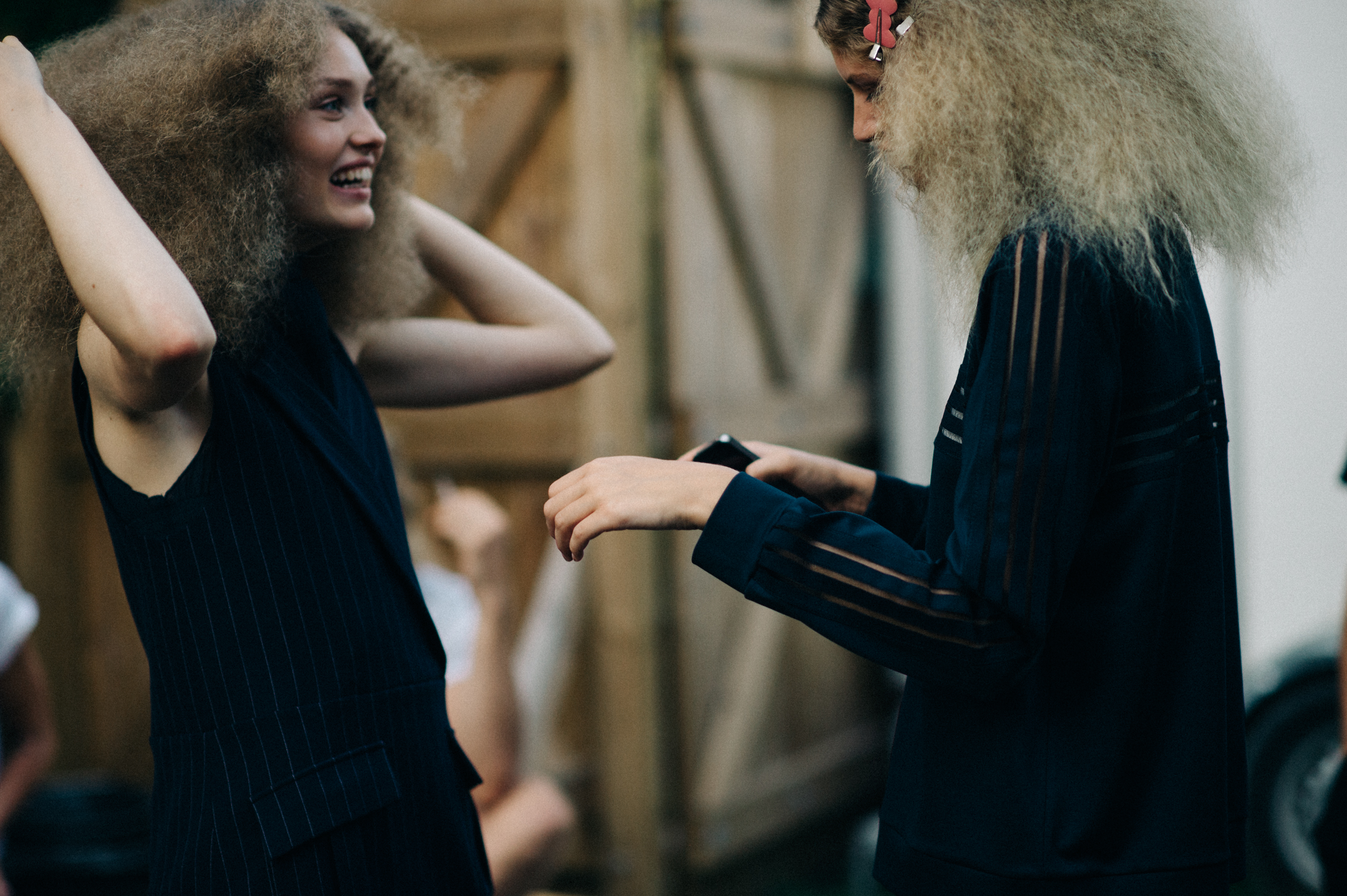 Two curly models at the show