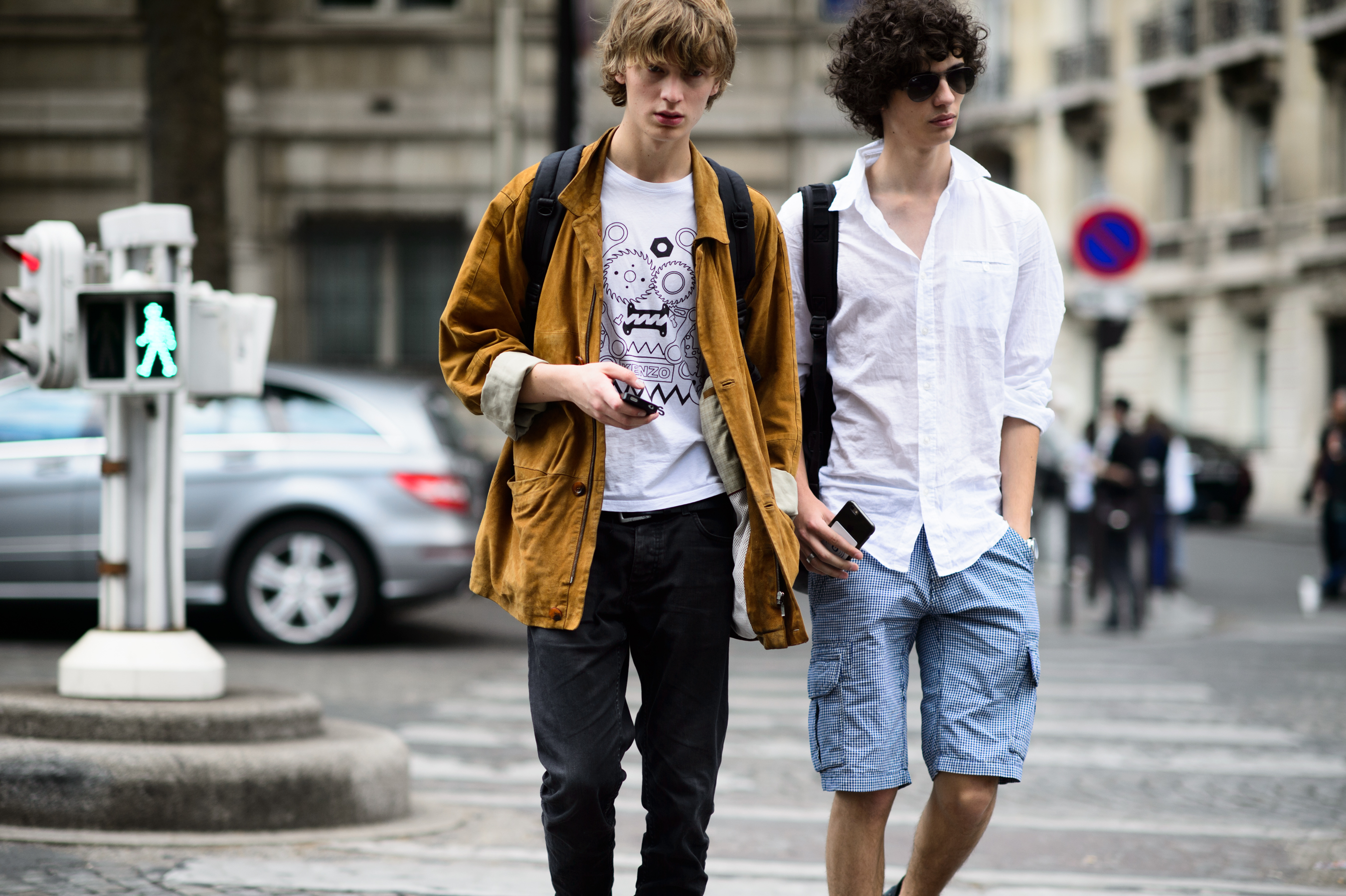 Two male models after the show