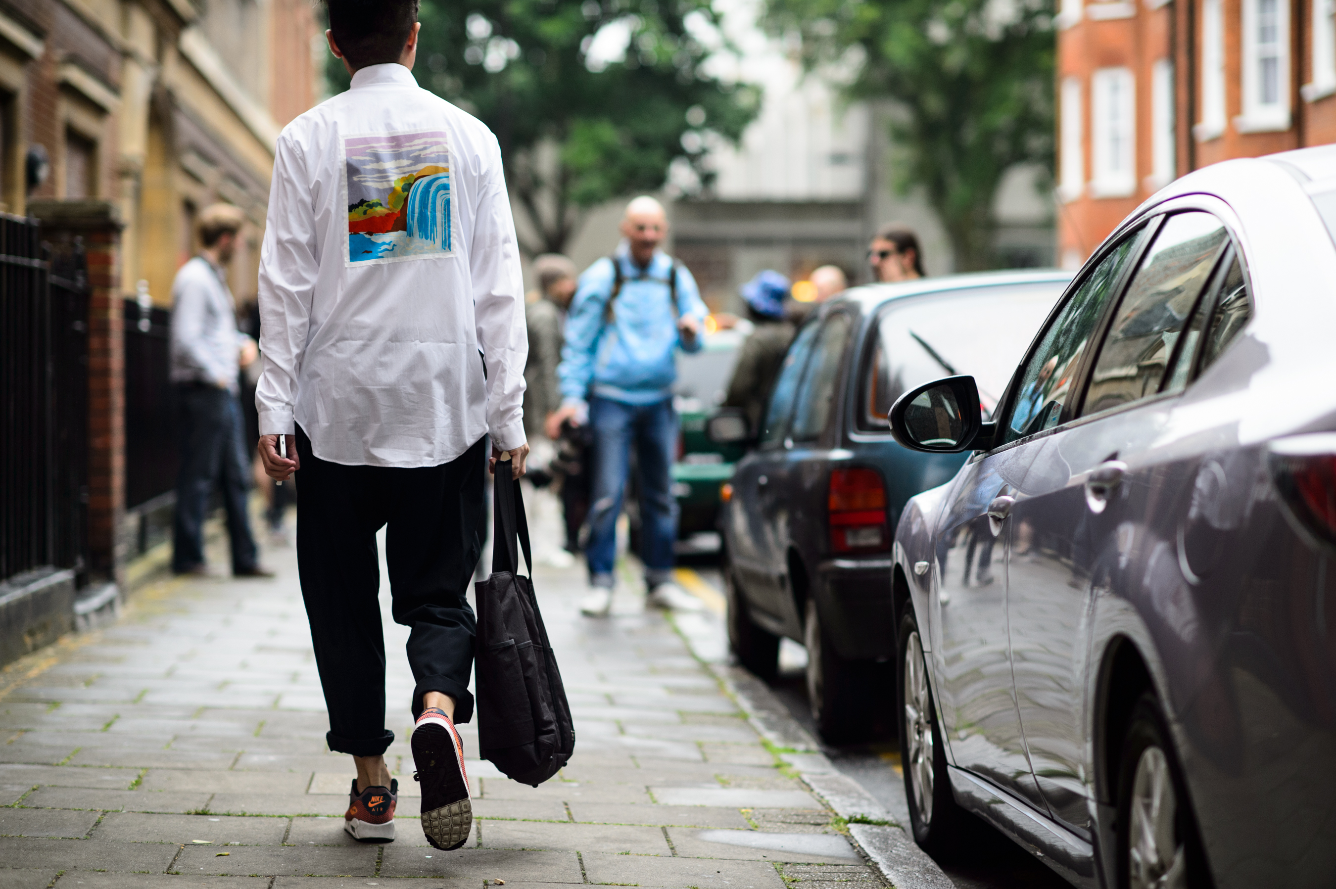 Man wearing shirt with path on the back