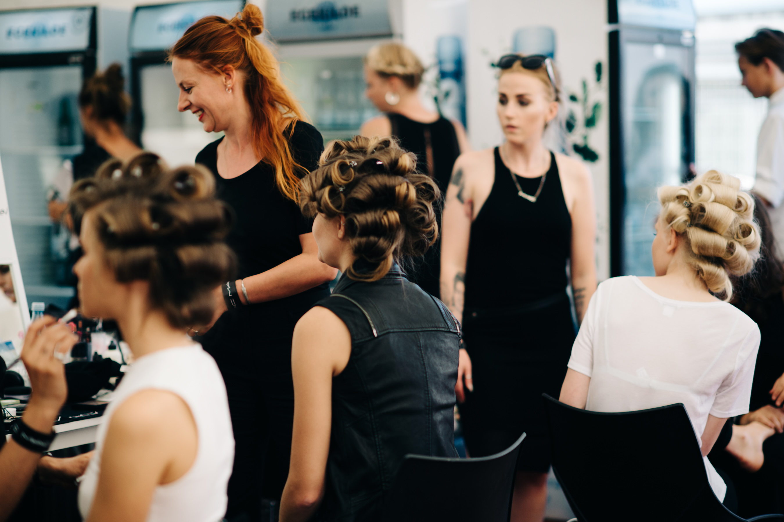 Danish models getting hair done before the show