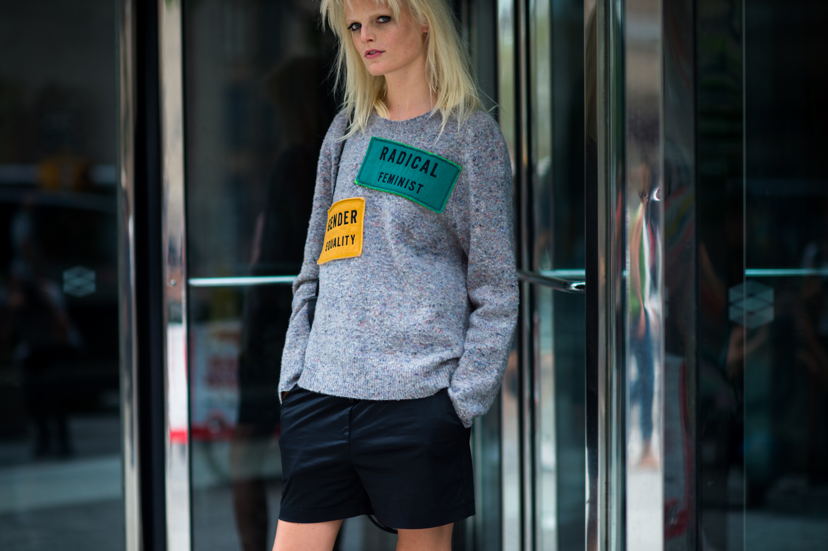 Belgian top model wearing grey sweatshirt