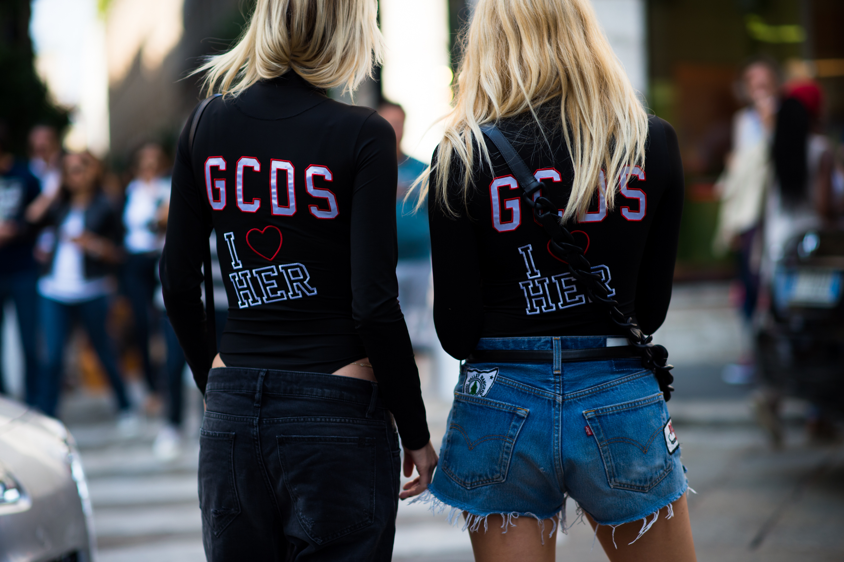 Two blonde girls after fashion show
