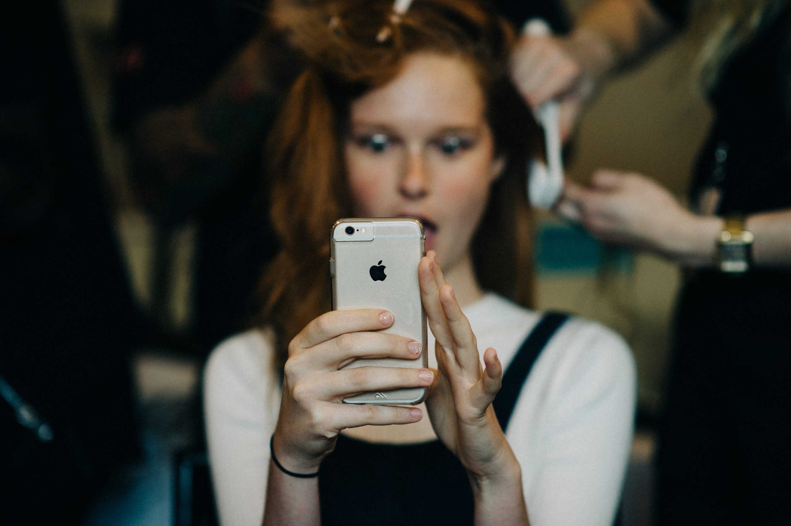 Model taking a selfie before the show