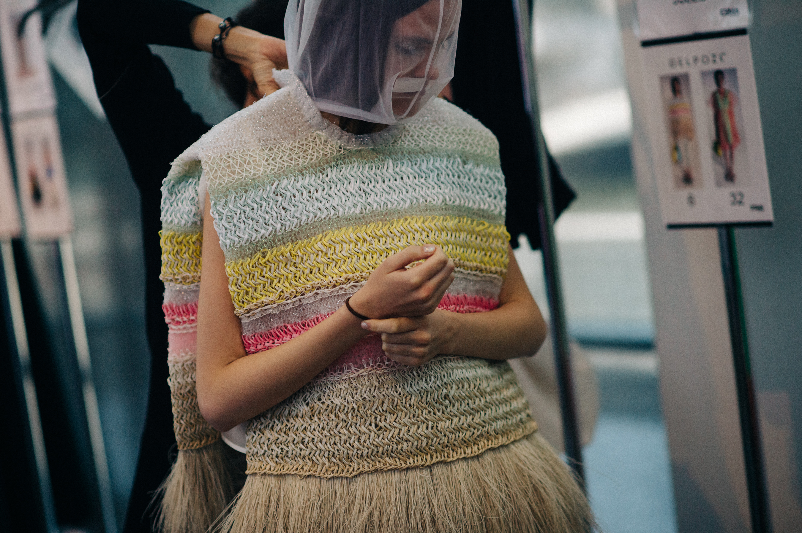 Model wearing outfit before the show