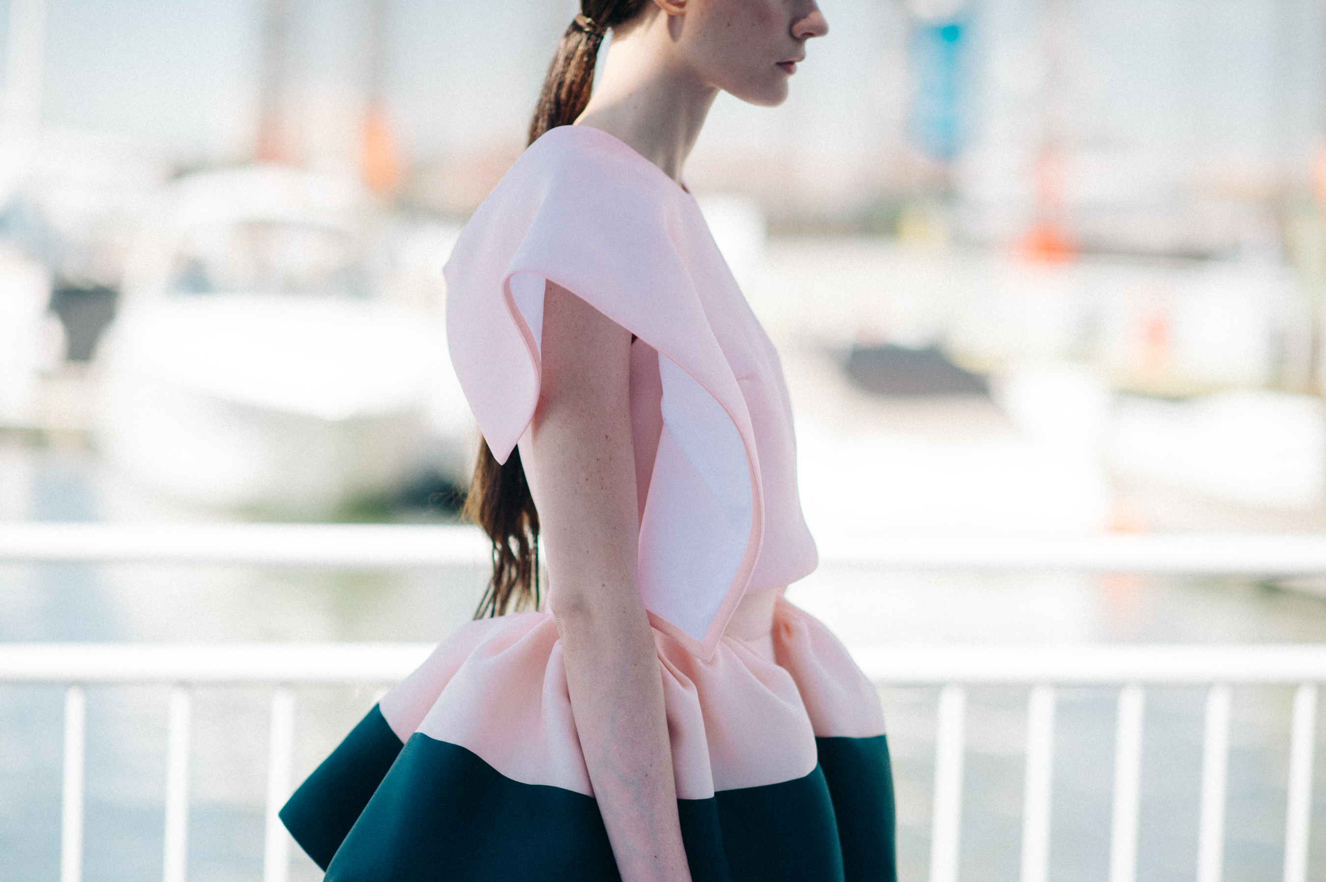 Model dressed in pink before the show