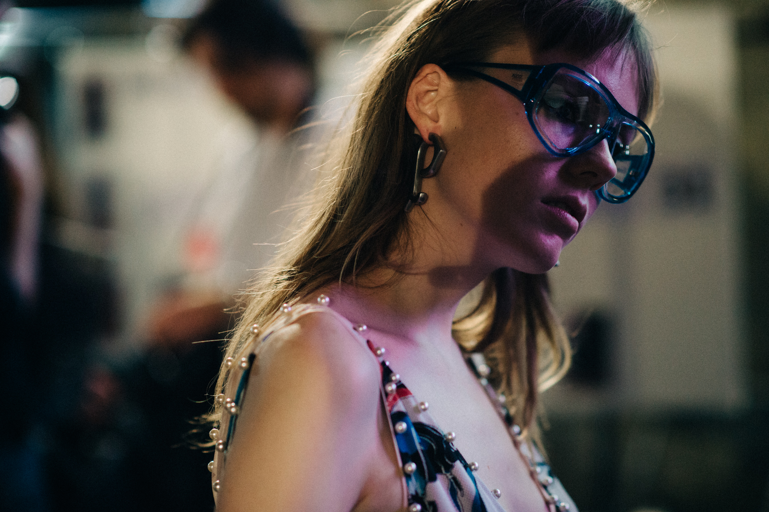 Model wearing glasses before the show