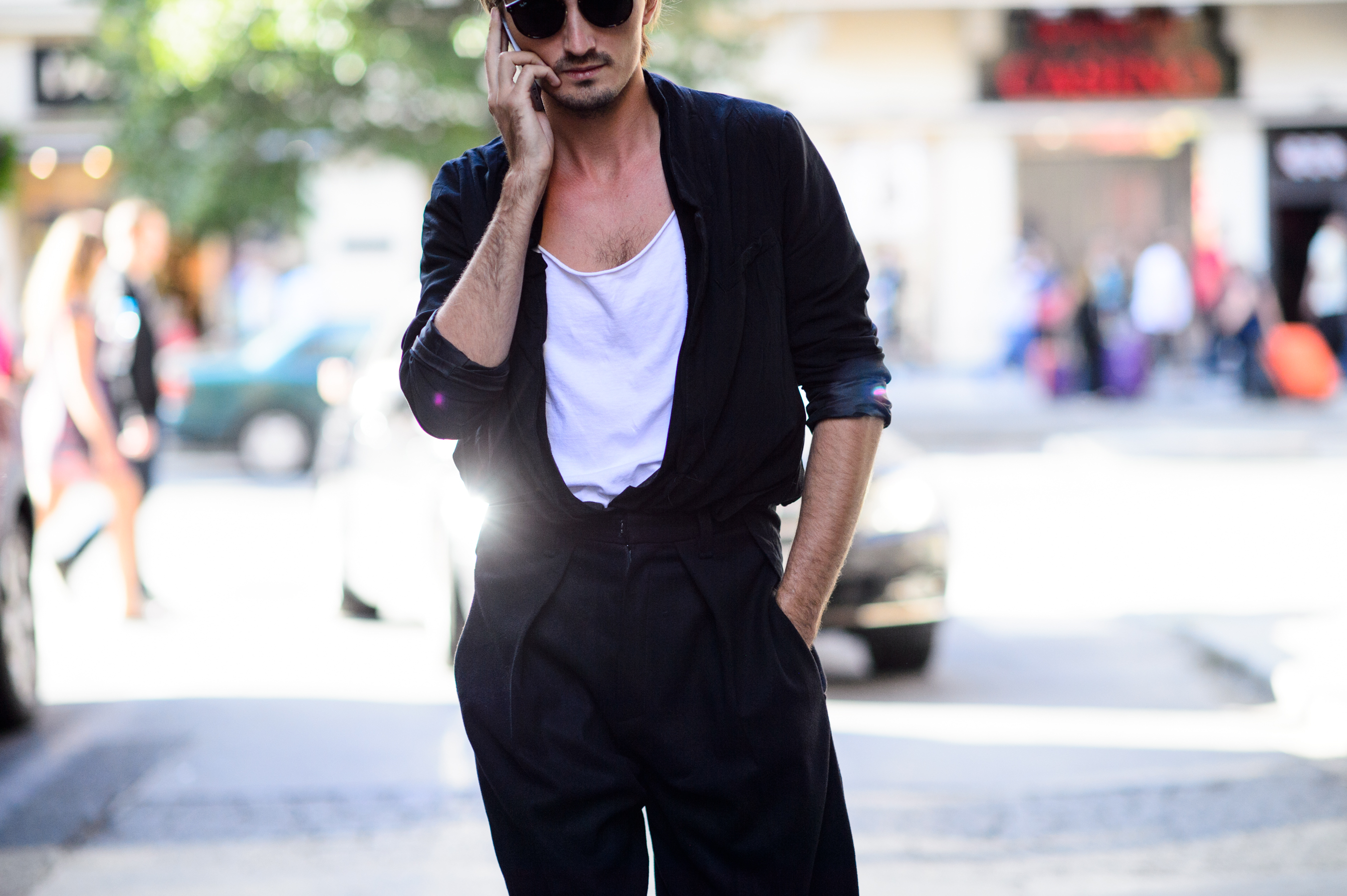 Man wearing white t-shirt and jumpsuit