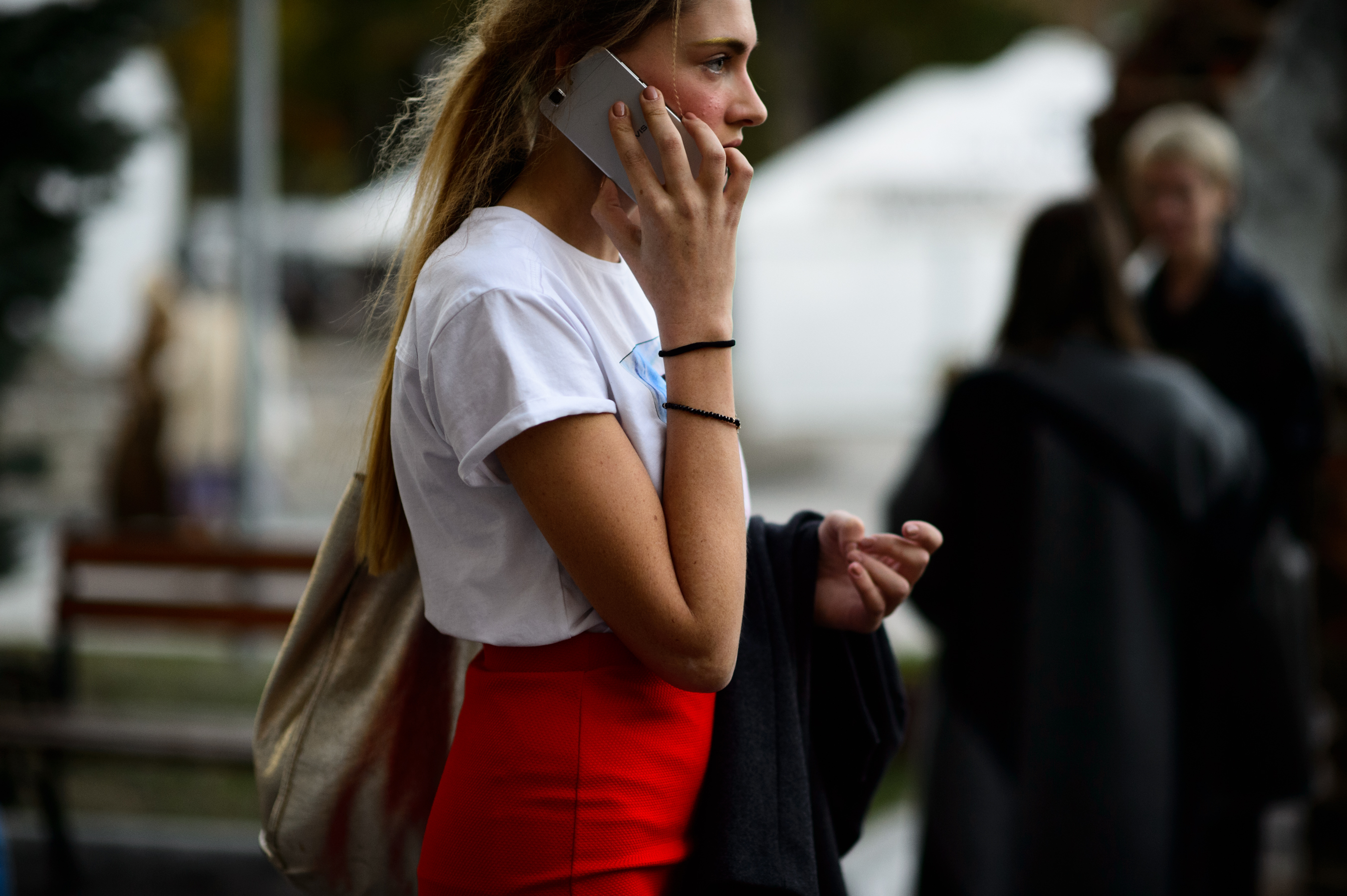 Ukrainian model talking on a phone at the UFW show venue