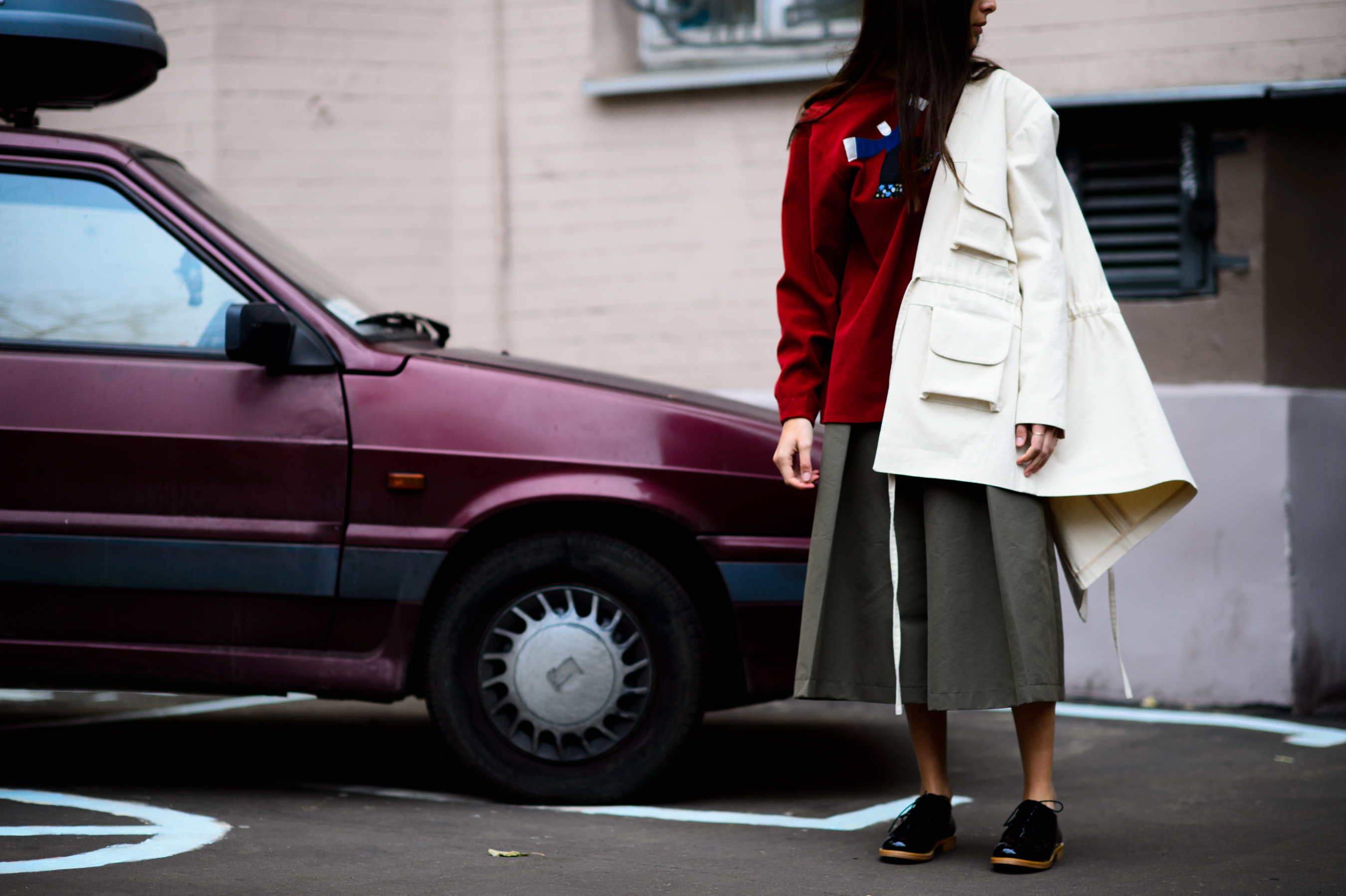Georgian girl outside of her showroom