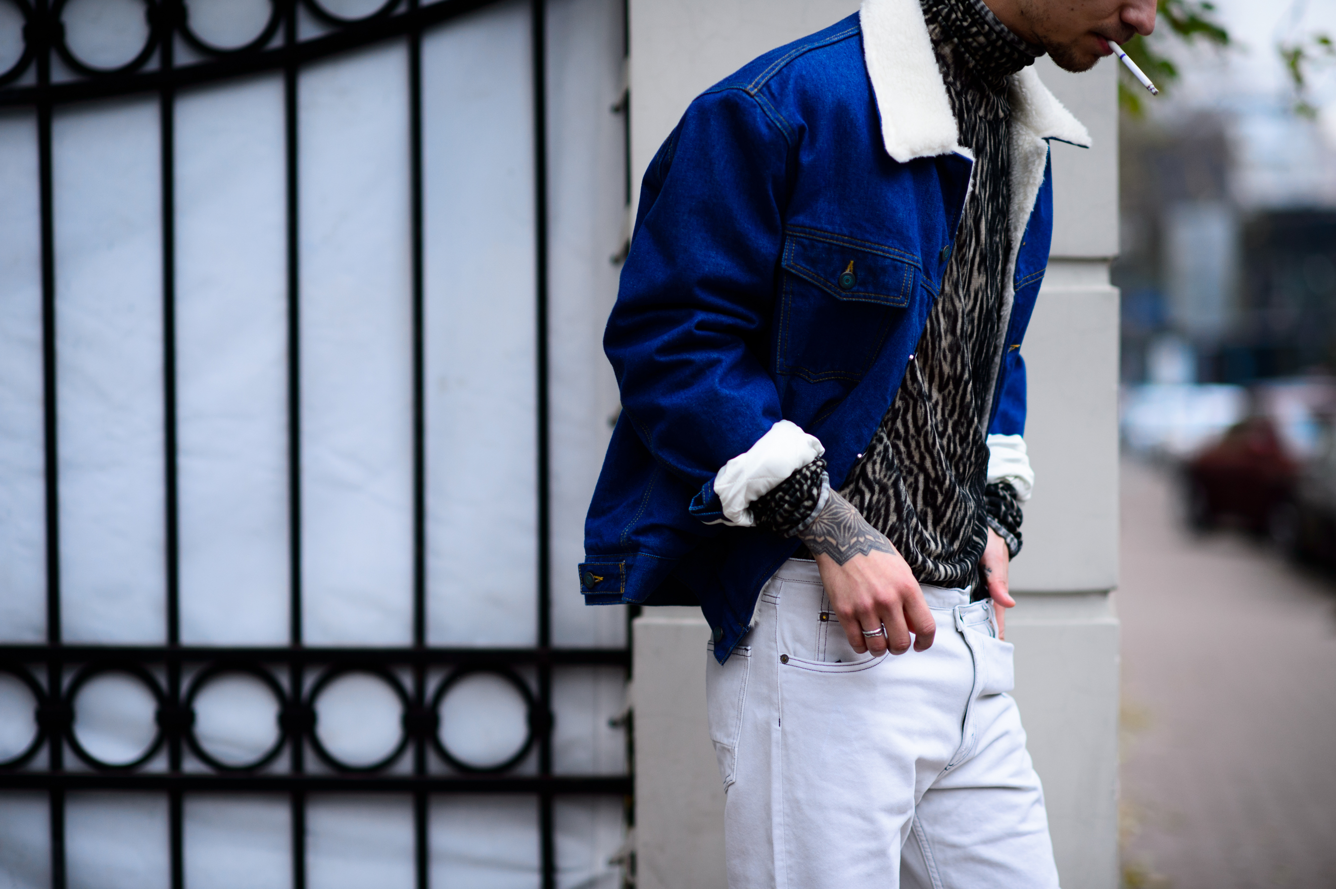 Russian guy smoking in denim jacket