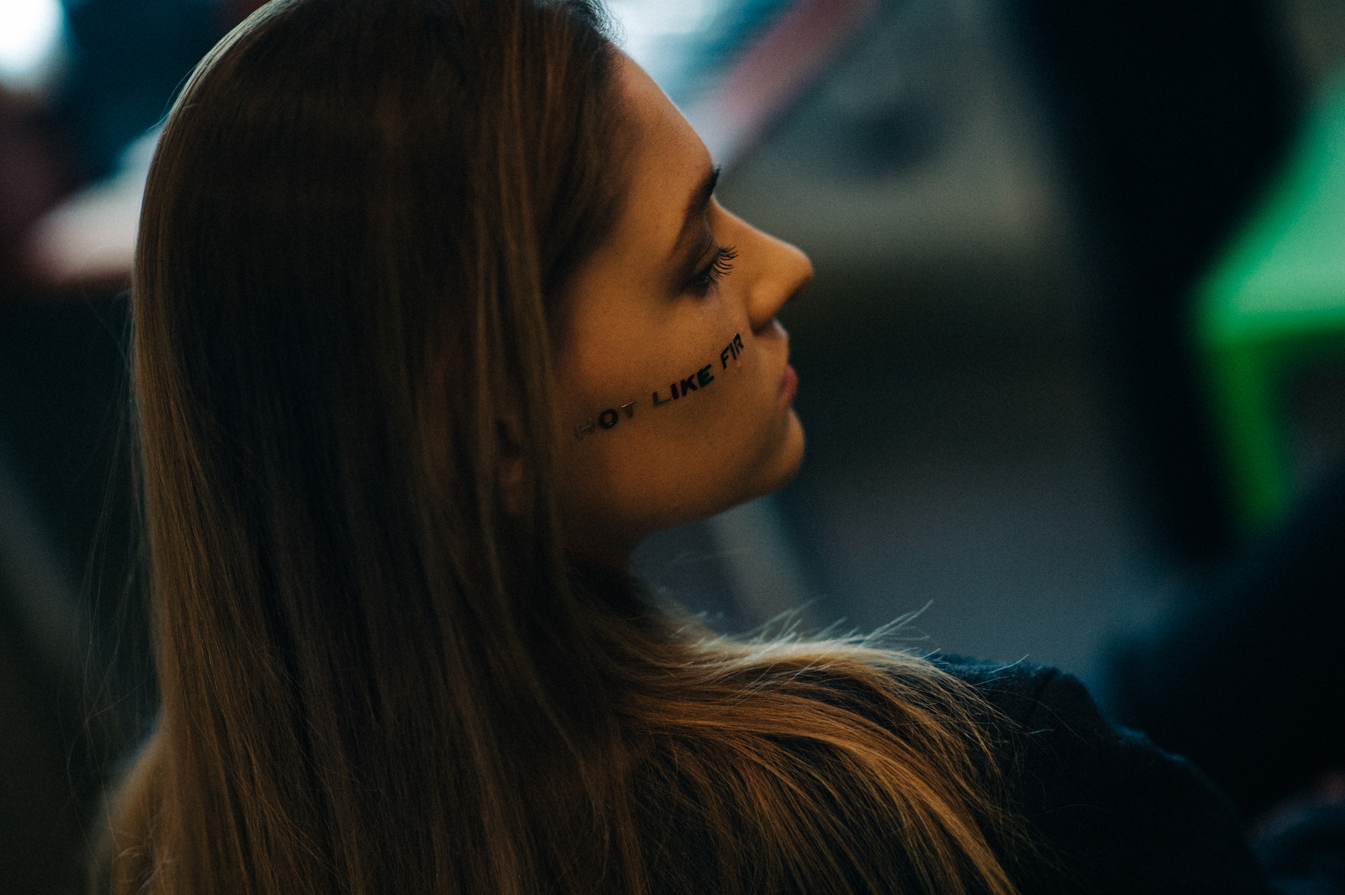 Model getting make up with letters