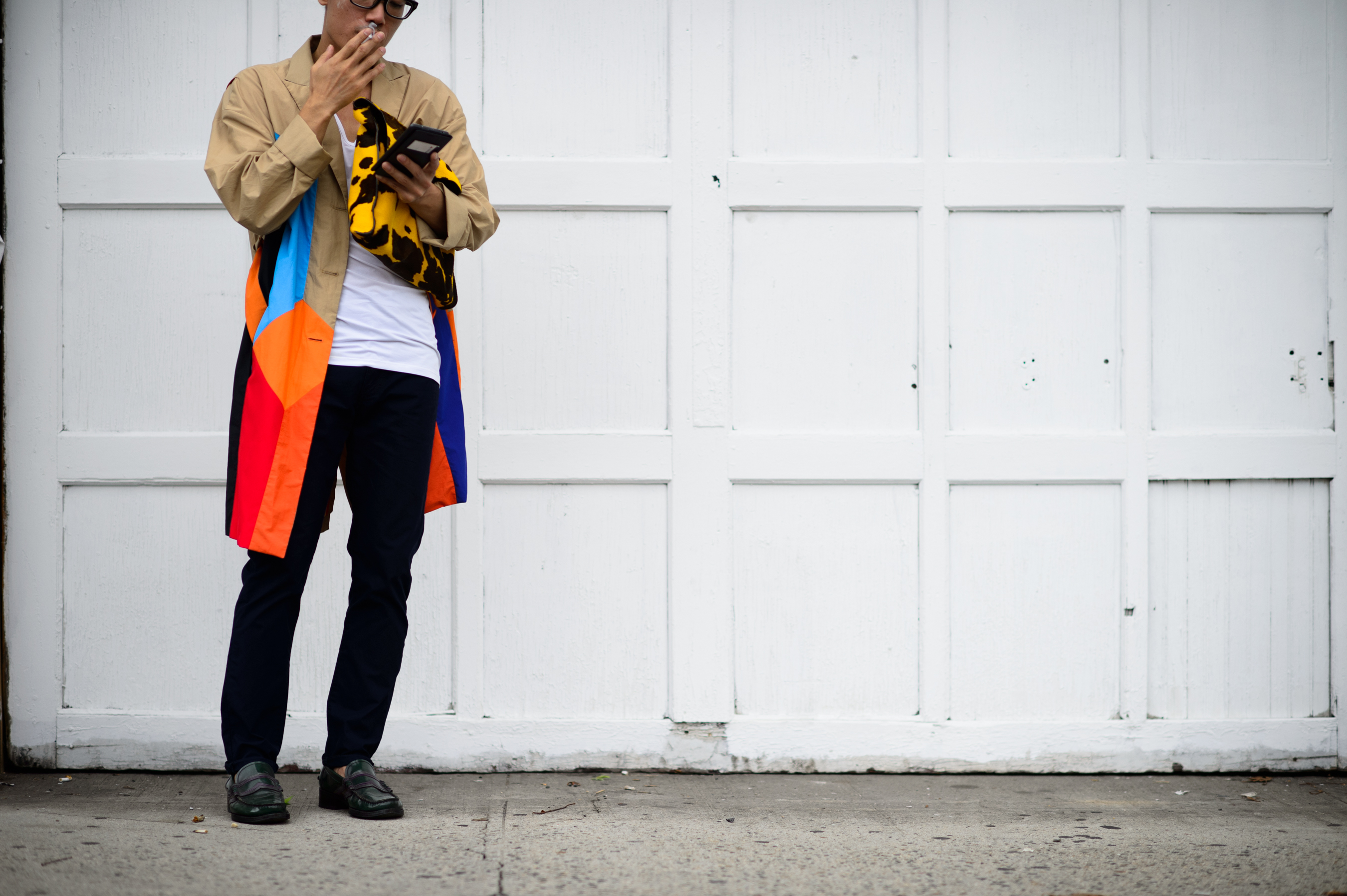 Man wearing trench jacket with colour blocks
