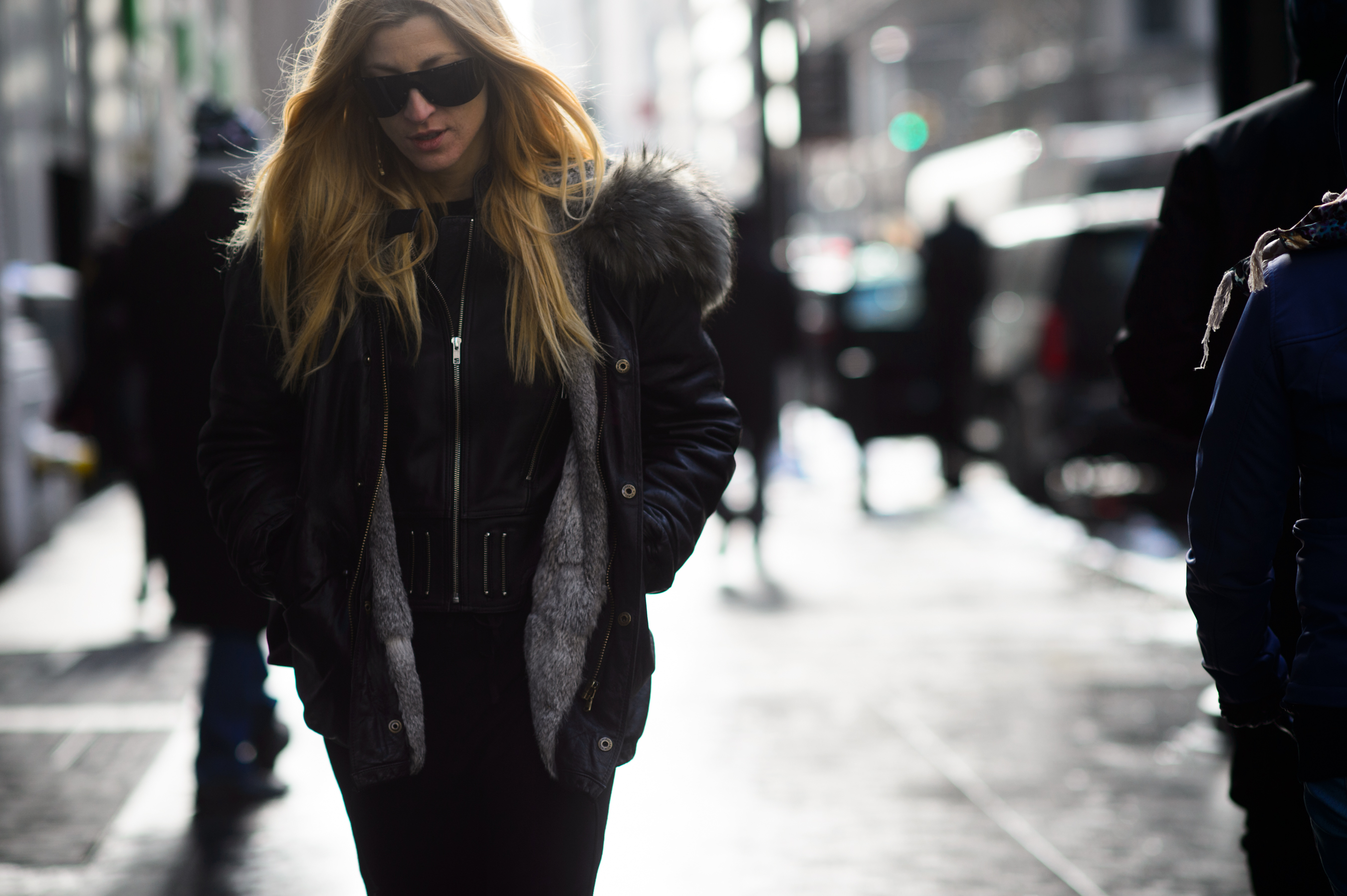 Italian stylist wearing leather jacket