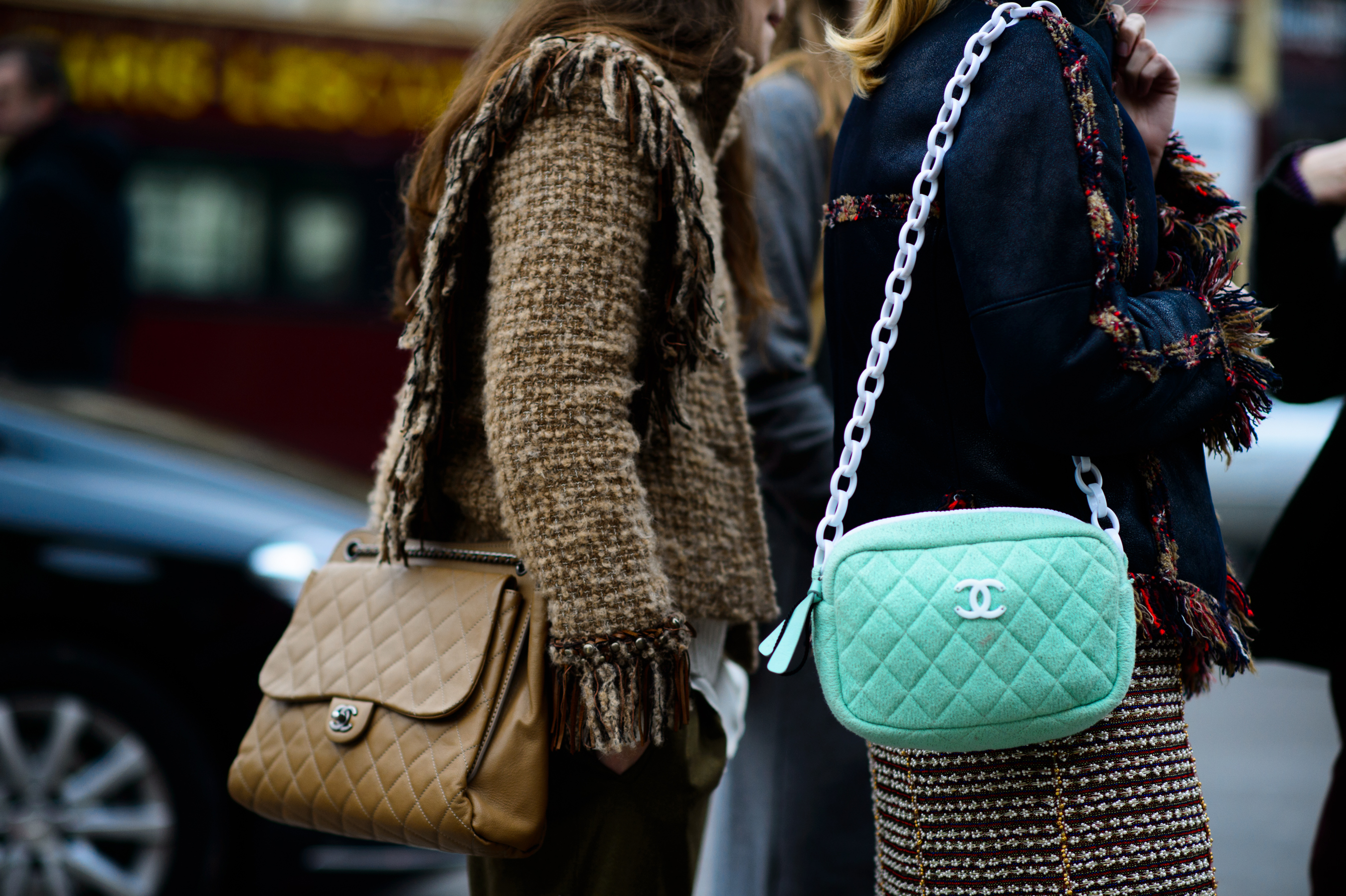 Two women with Chanel bags after the show