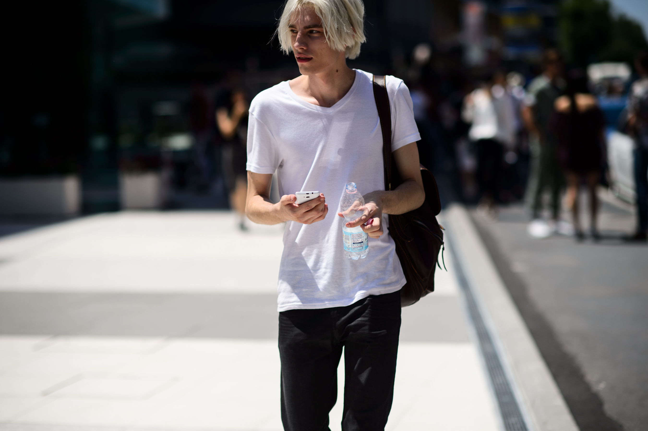 Male model with white hair after the show