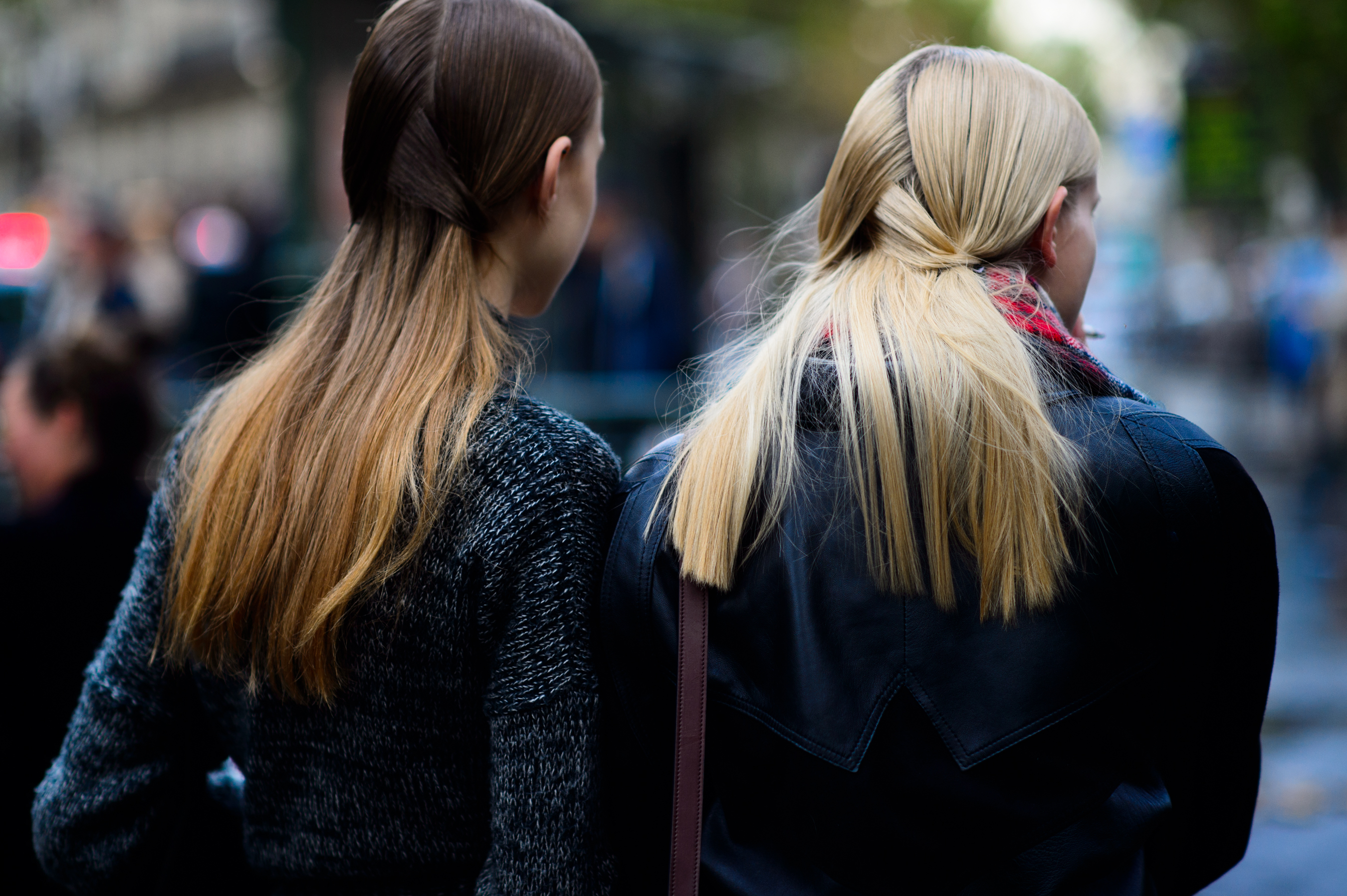 Two models with braided hair after the show